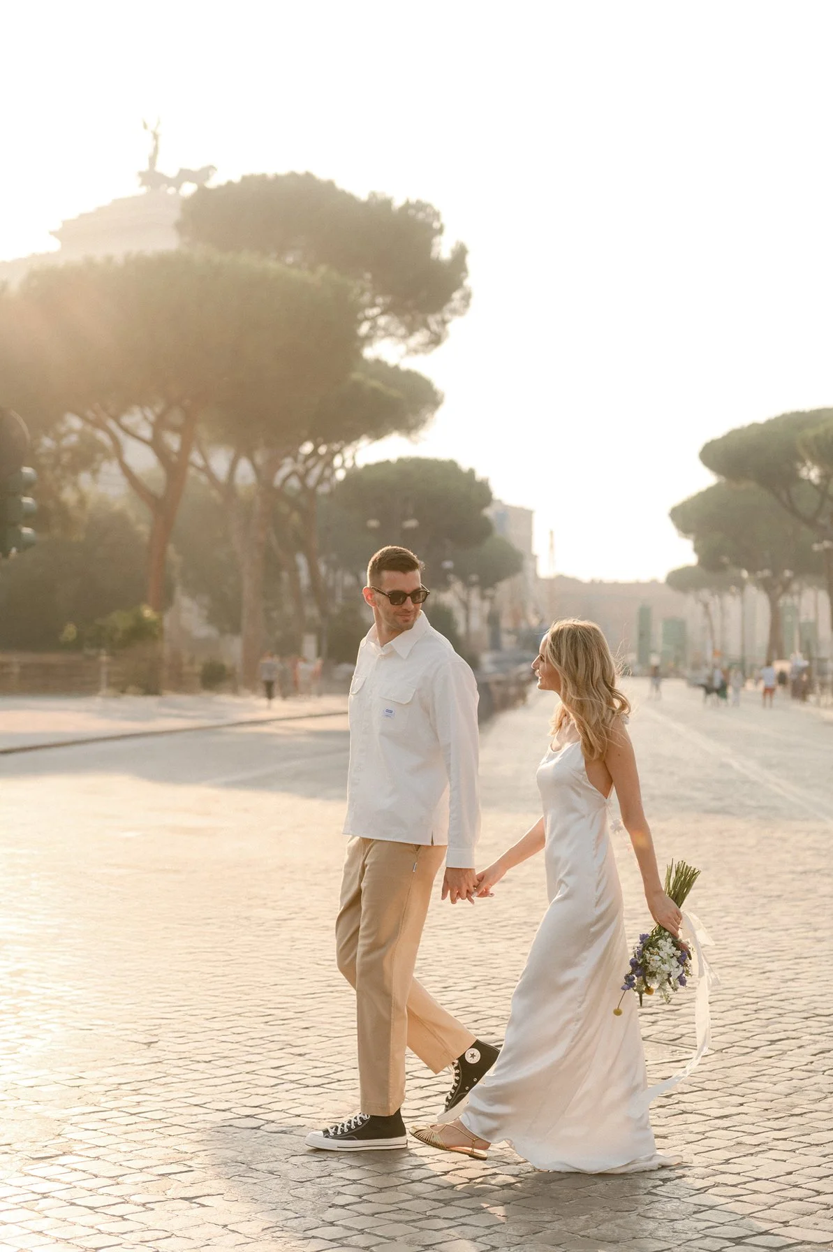 Cinematic couple photoshoot in Rome near the Colosseum at sunset
