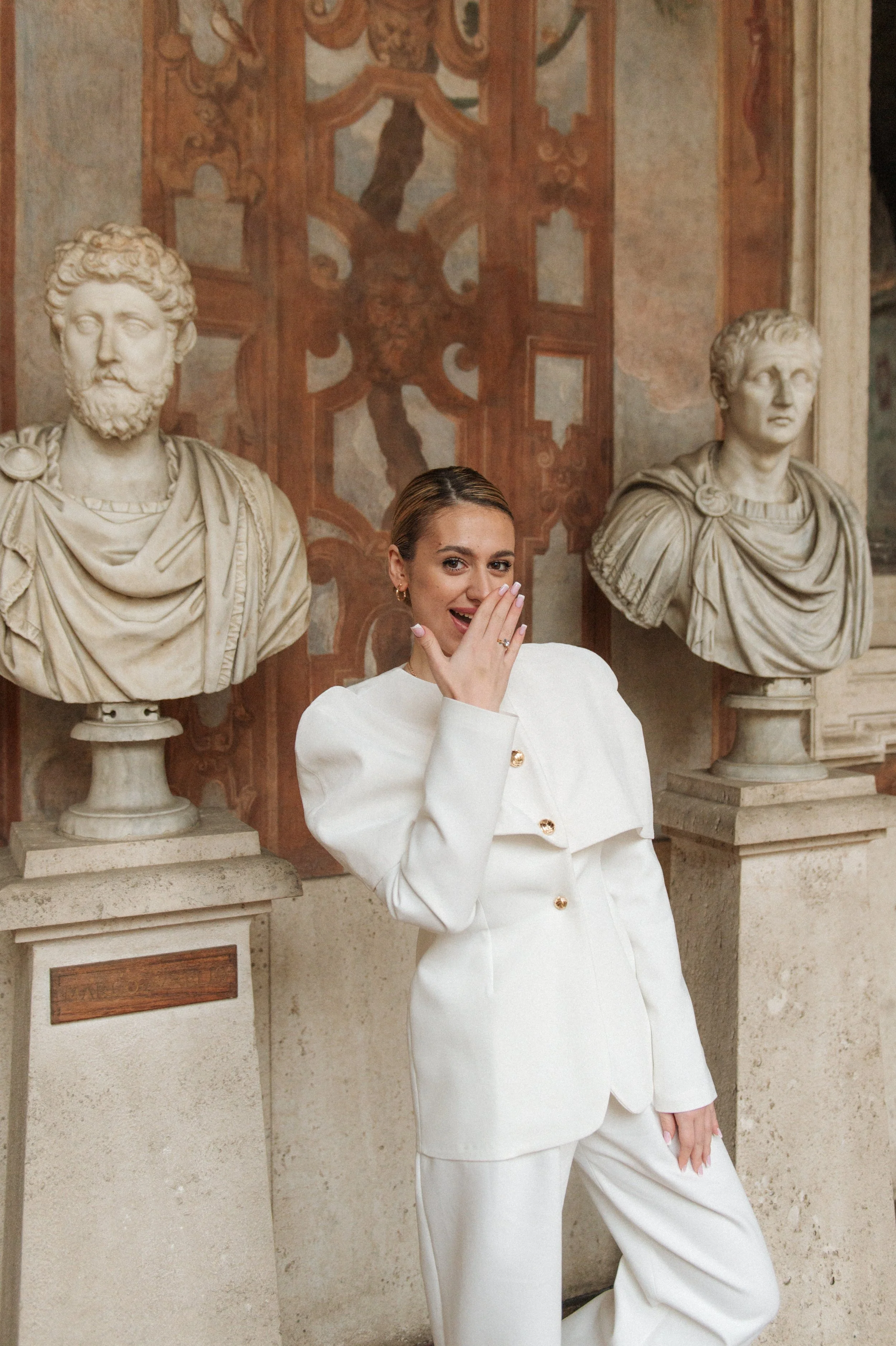 Editorial style portrait photoshoot in Rome museum with classical sculptures, Palazzo Altemps