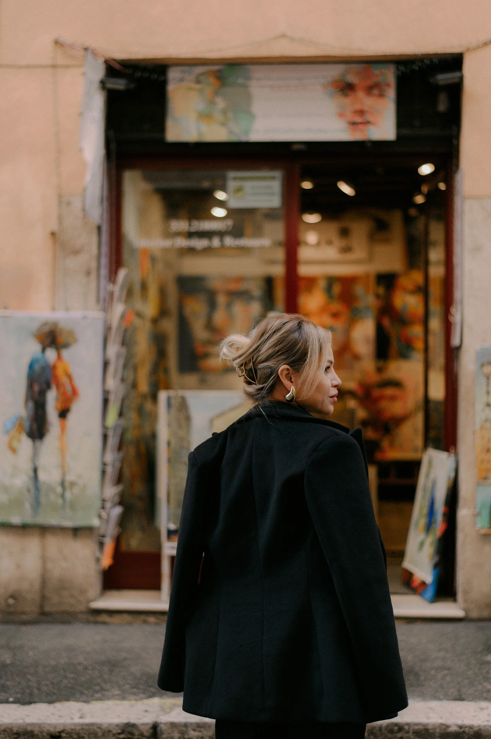 Candid solo photoshoot in Rome capturing a woman walking through the city in a natural cinematic style