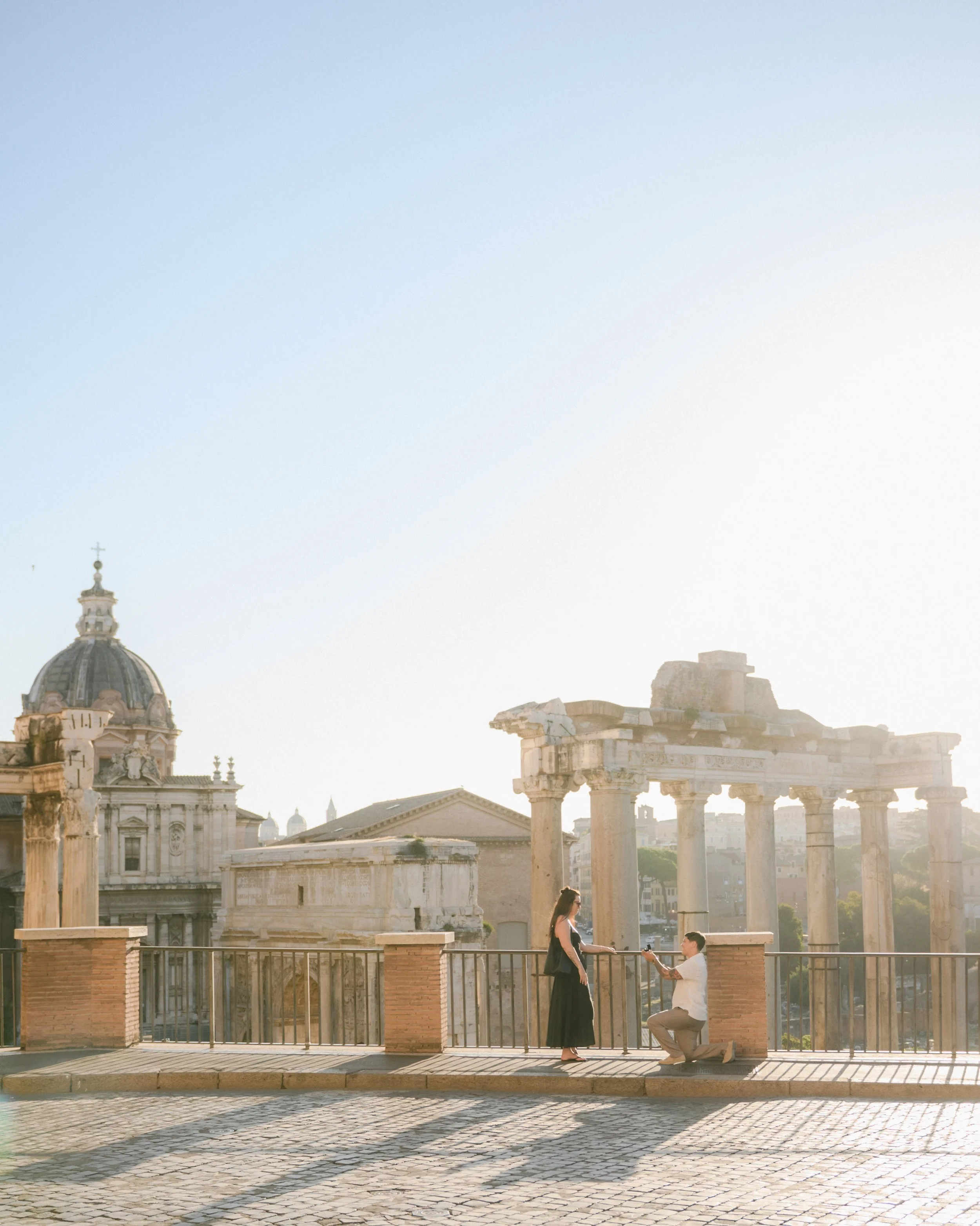 Surprise proposal in Rome with ancient ruins and city view