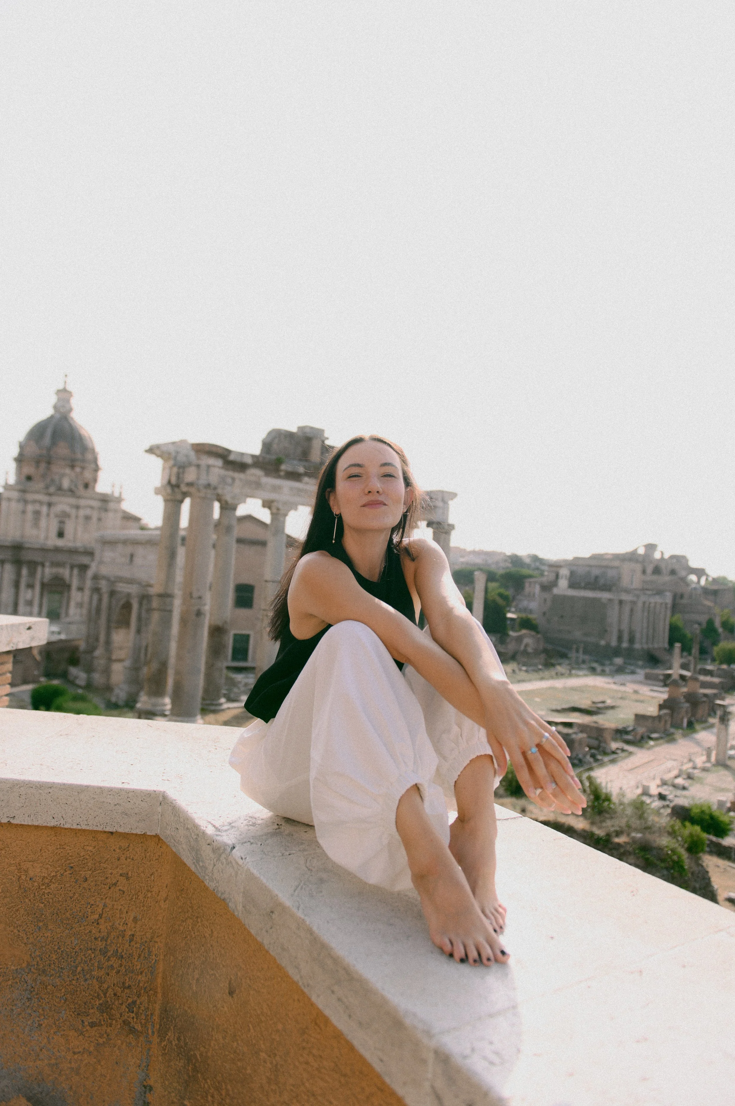 Portrait photoshoot in Rome with historic architecture Roman forum