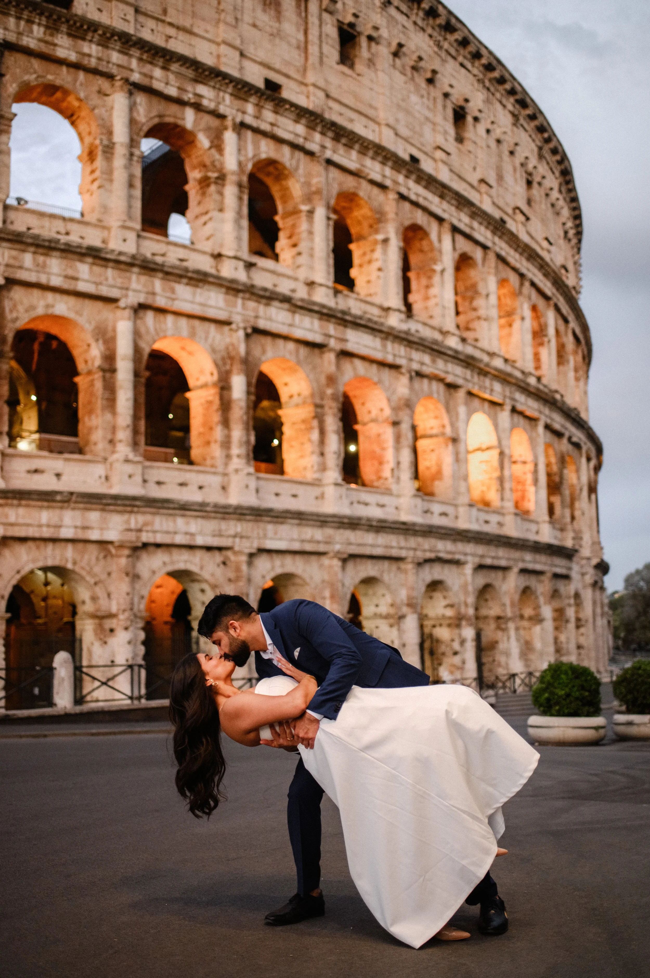 Couple photoshoot at Colosseum in Rome

