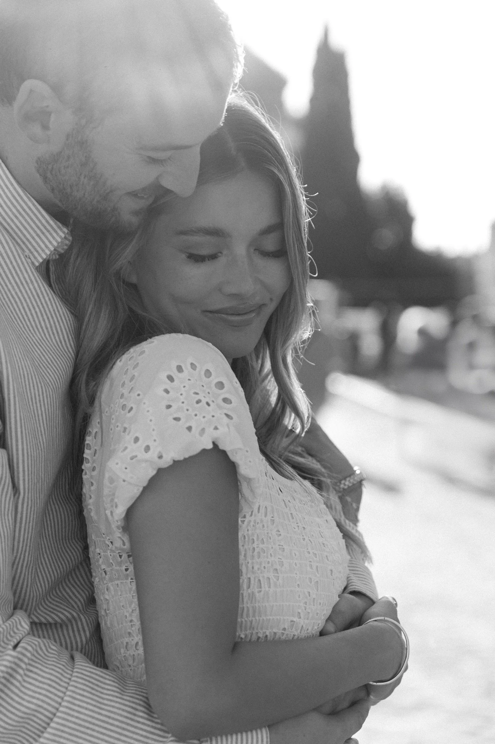 Intimate cinematic moment during a Rome engagement session