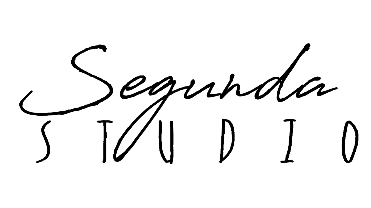 Optical illusion artwork of a black face profile and a white woman's silhouette.