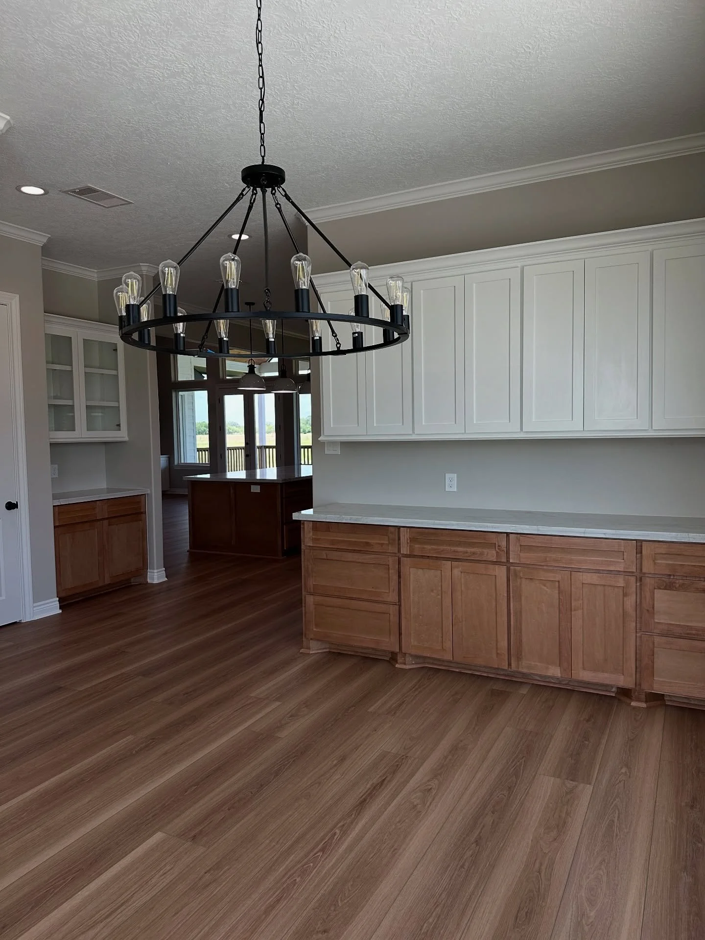 Designed with everyday living in mind 🍽️ 
This dining room, just off the kitchen, features abundant natural light, smart built-in storage, and a seamless flow&mdash;proving that custom homes should be as functional as they are beautiful. 

#CustomHo
