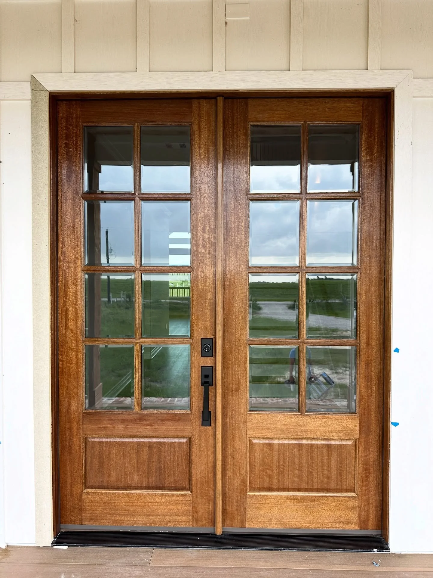 A front porch with natural warmth from top to bottom&mdash;doors, beams, and ceiling in perfect harmony.
.
#CustomHomeBuilder
#DreamHomeDesign
#CustomHomes
#HomeBuilderLife
#LuxuryHomeBuilder
#HouseGoals
#ForeverHome
#NewBuildDesign
#CustomBuiltHome
