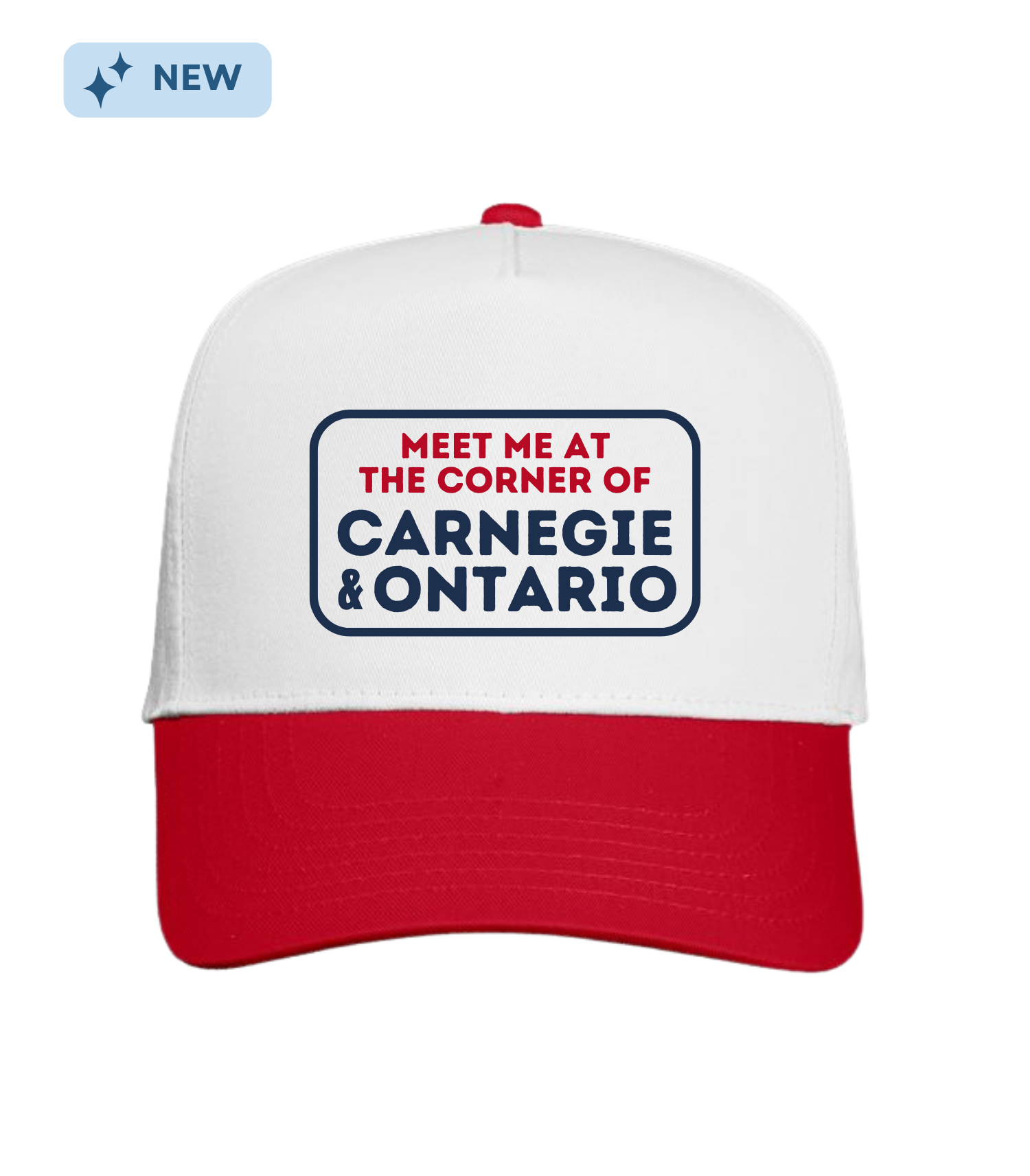 A trucker cap with a white front panel and red brim, displaying a slogan in dark blue and red text that reads 'Meet me at the corner of Carnegie & Ontario,' with a small blue 'NEW' tag on the top left corner.