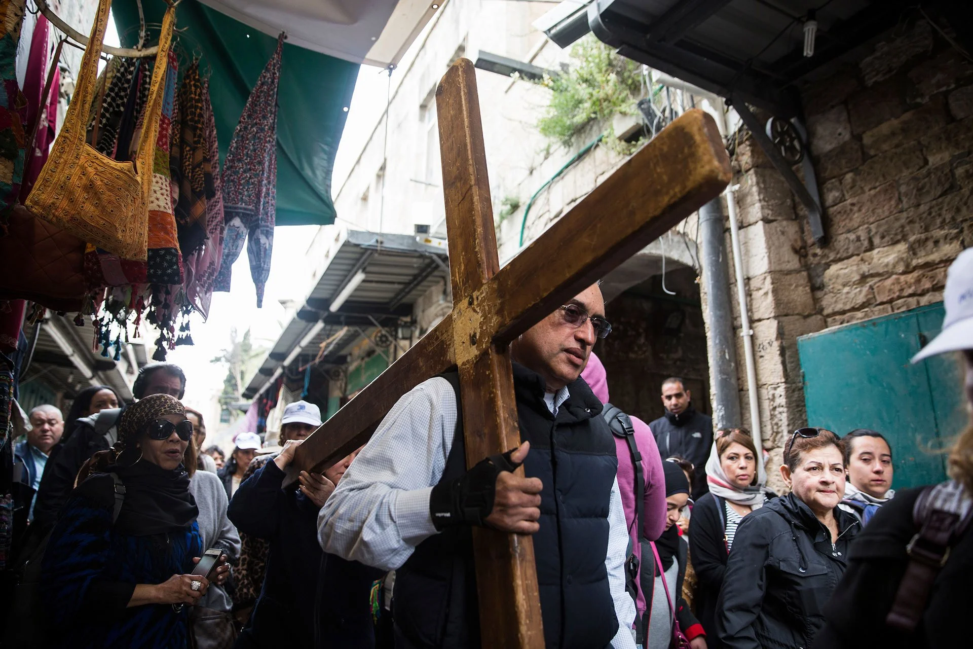 Christian worshippers along the Via Dolorosa during the Good Friday procession in Jerusalem’s Old City.Christians held processions today in the Old City of Jerusalem and around the world as they marked the holiday of Good Friday,commemorating the cru