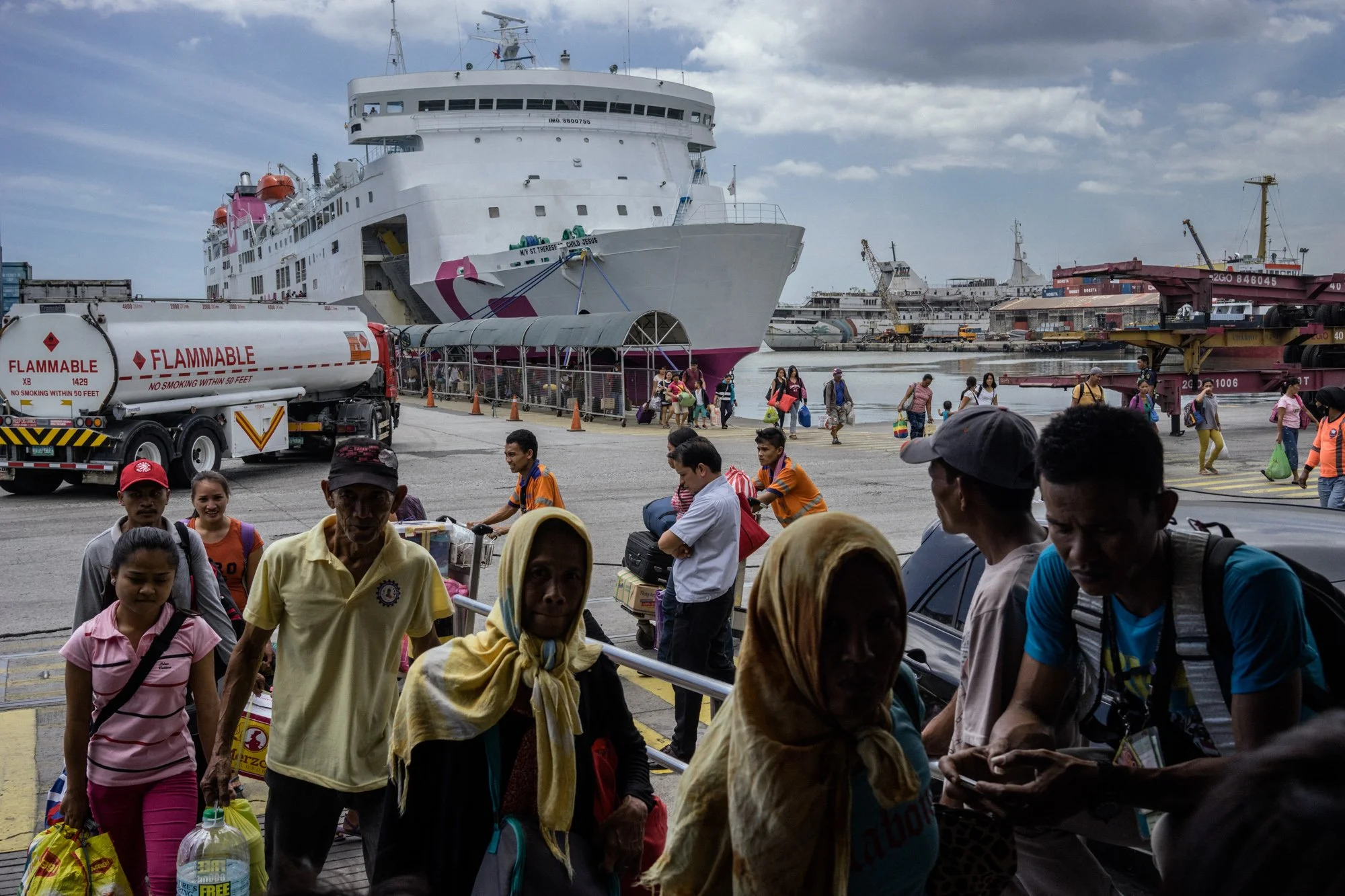 A boat arrives at the Manila port. Many girls on their way out of the province make their way through this boat. 