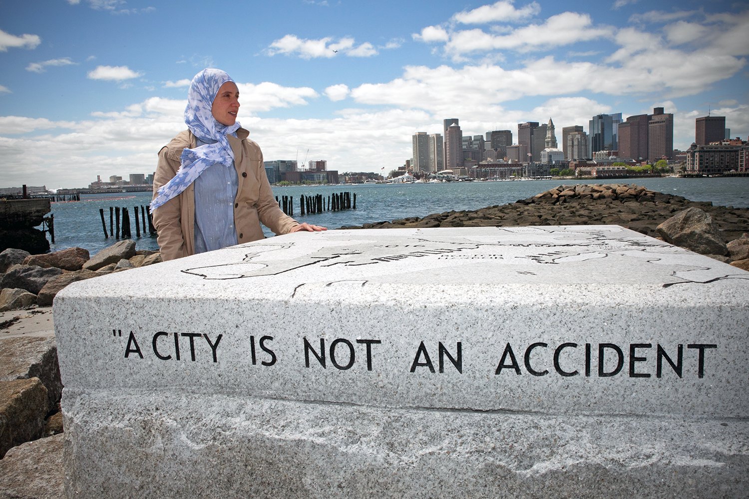 Magdalena Ayed, pictured here in her East Boston neighborhood, says new developments need to be resistant to climate change.
