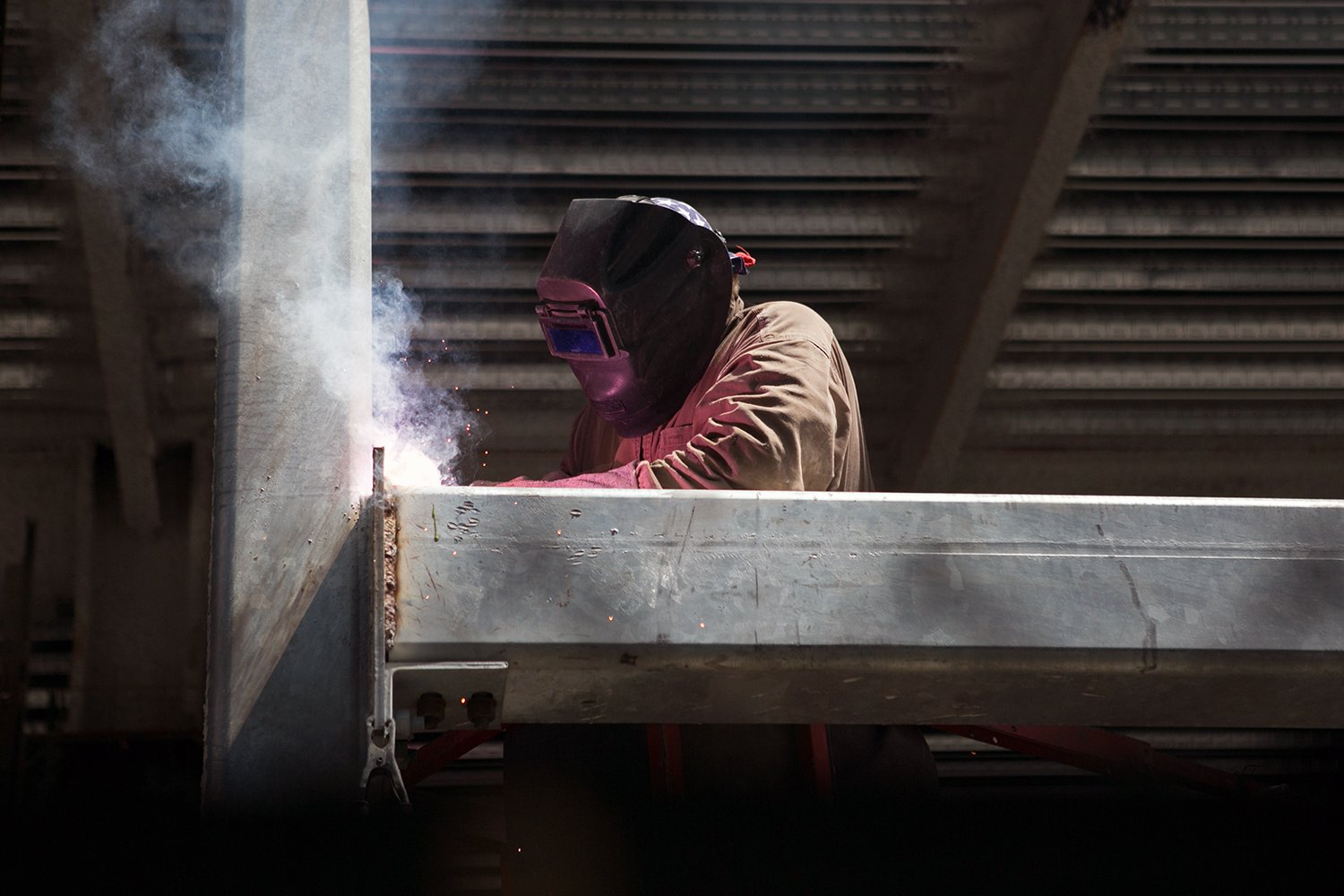 Production welder Steve Makein works on a new building in South Boston on June 6, 2016. 