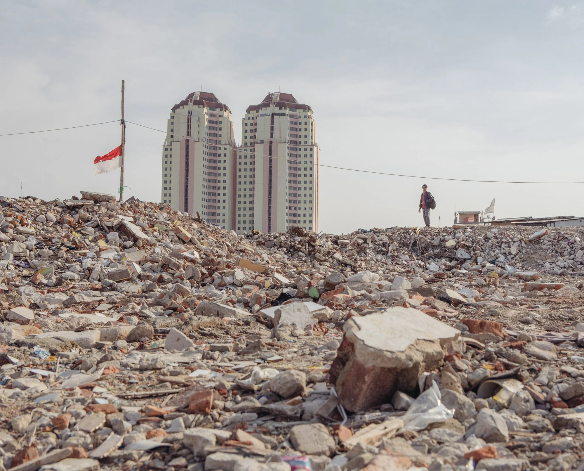 As part of Jakarta’s river revitalization project, Pasar Ikan district was recently razed, leaving its residents homeless. 