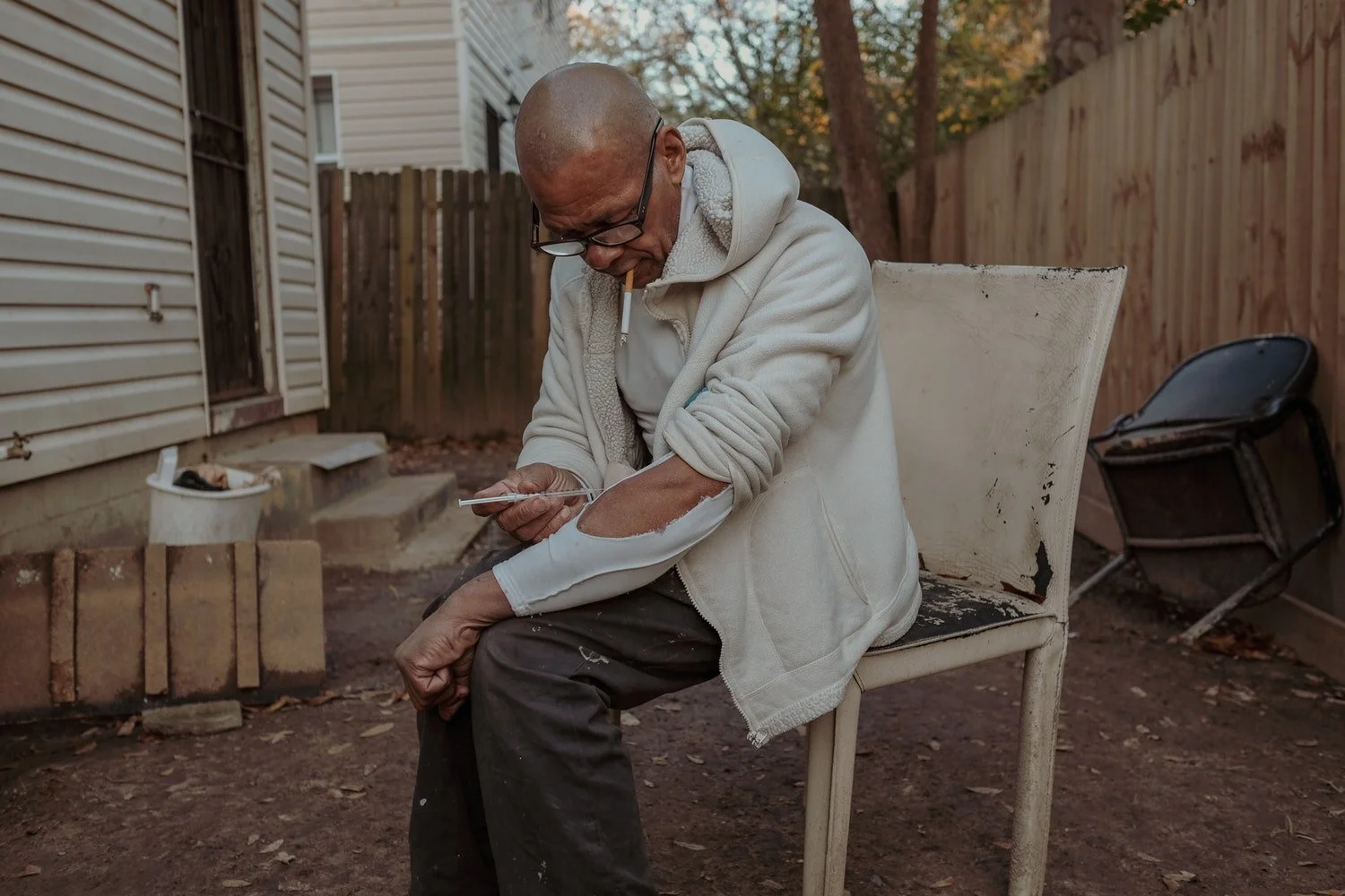  Shanell, 57, injects heroin into his arm in Atlanta, Georgia. “I’ve had several family members die because they contracted HIV from needle usage. Heroin addiction in my family is common,” Shanell said. “I had my first snuff of heroin when I was 7 ye