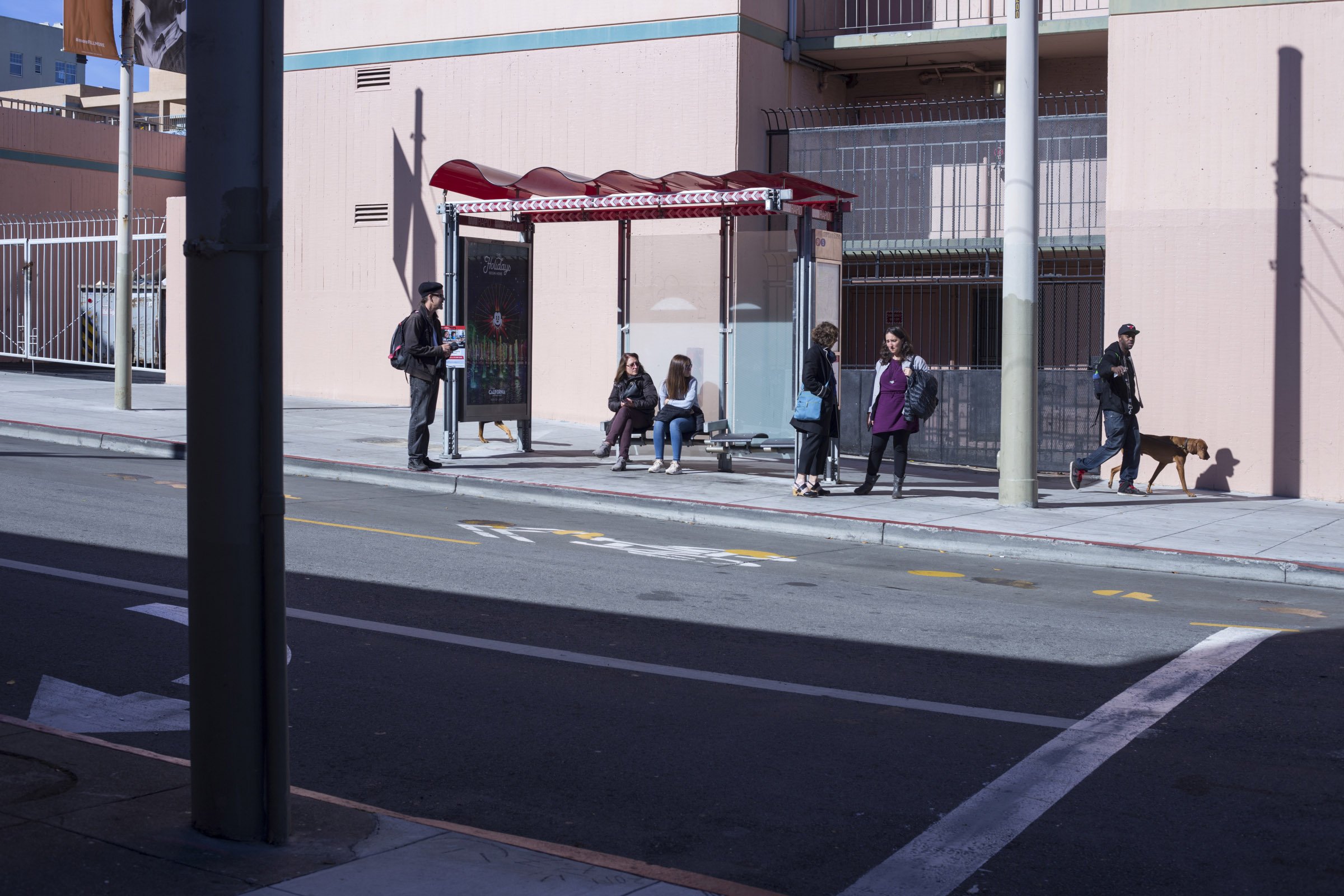  People wait for a bus in the Fillmore District of San Francisco, California, on Tuesday, November 7, 2017. (Photo by Brittany Greeson) 