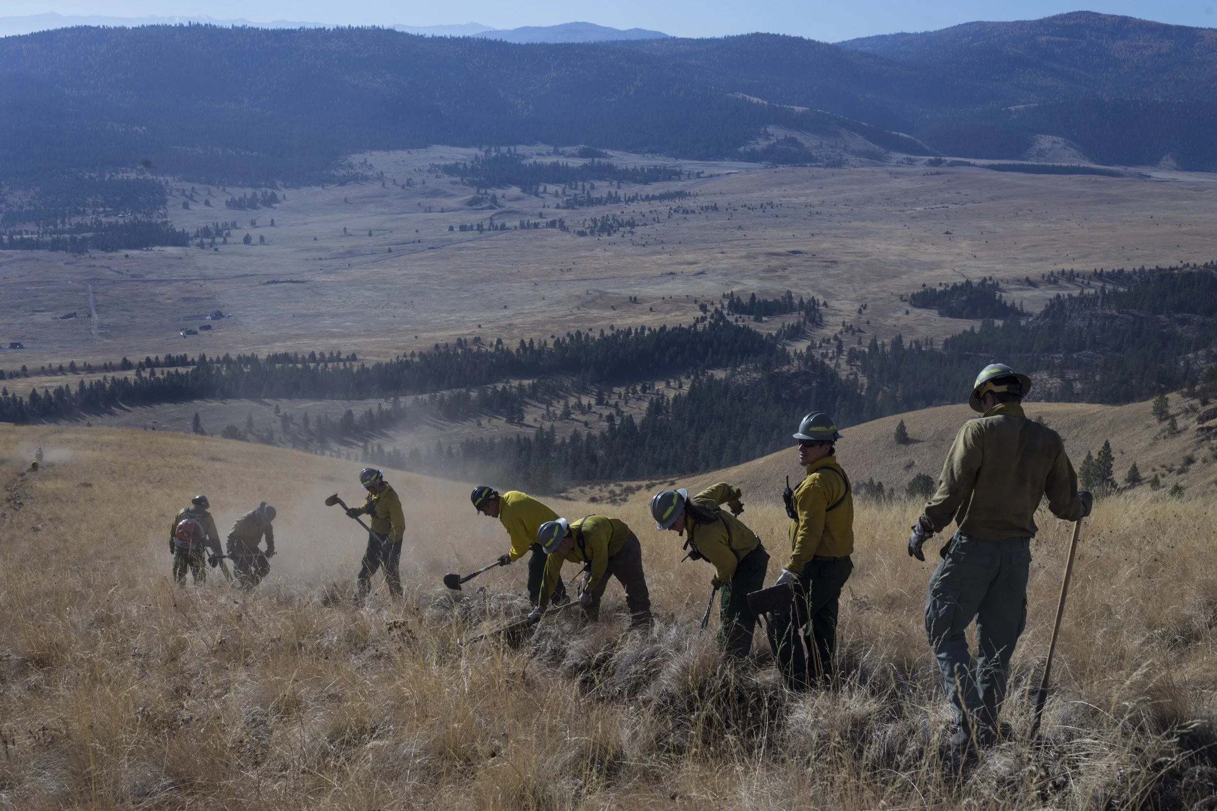  Members of the Confederated Salish and Kootenai Tribes Division of Fire prepare a barrier for a prescribed burn just along a ridge line outside of Elmo, Montana, on Tuesday, October 24, 2017. (Photo by Brittany Greeson) 