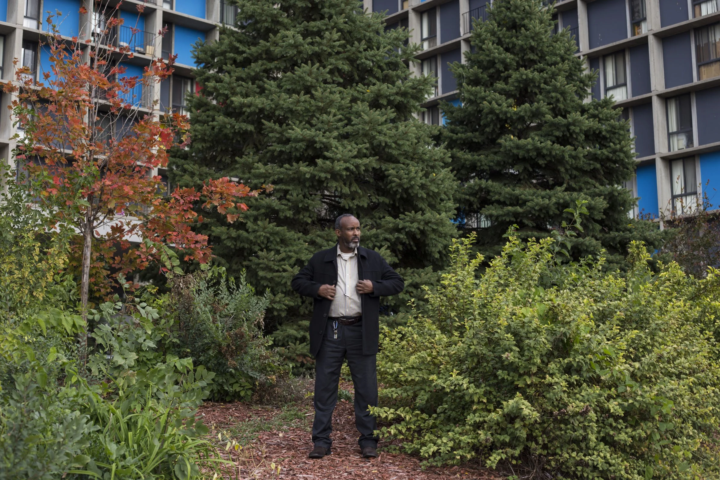  Abdirisaq Abdulle, 42, outside of his apartment building in the Cedar-Riverside neighborhood of Minneapolis, Minn., on Thursday, October 12, 2017. Abdulle, who immigrated to the United States before his children were born, said there was a generatio