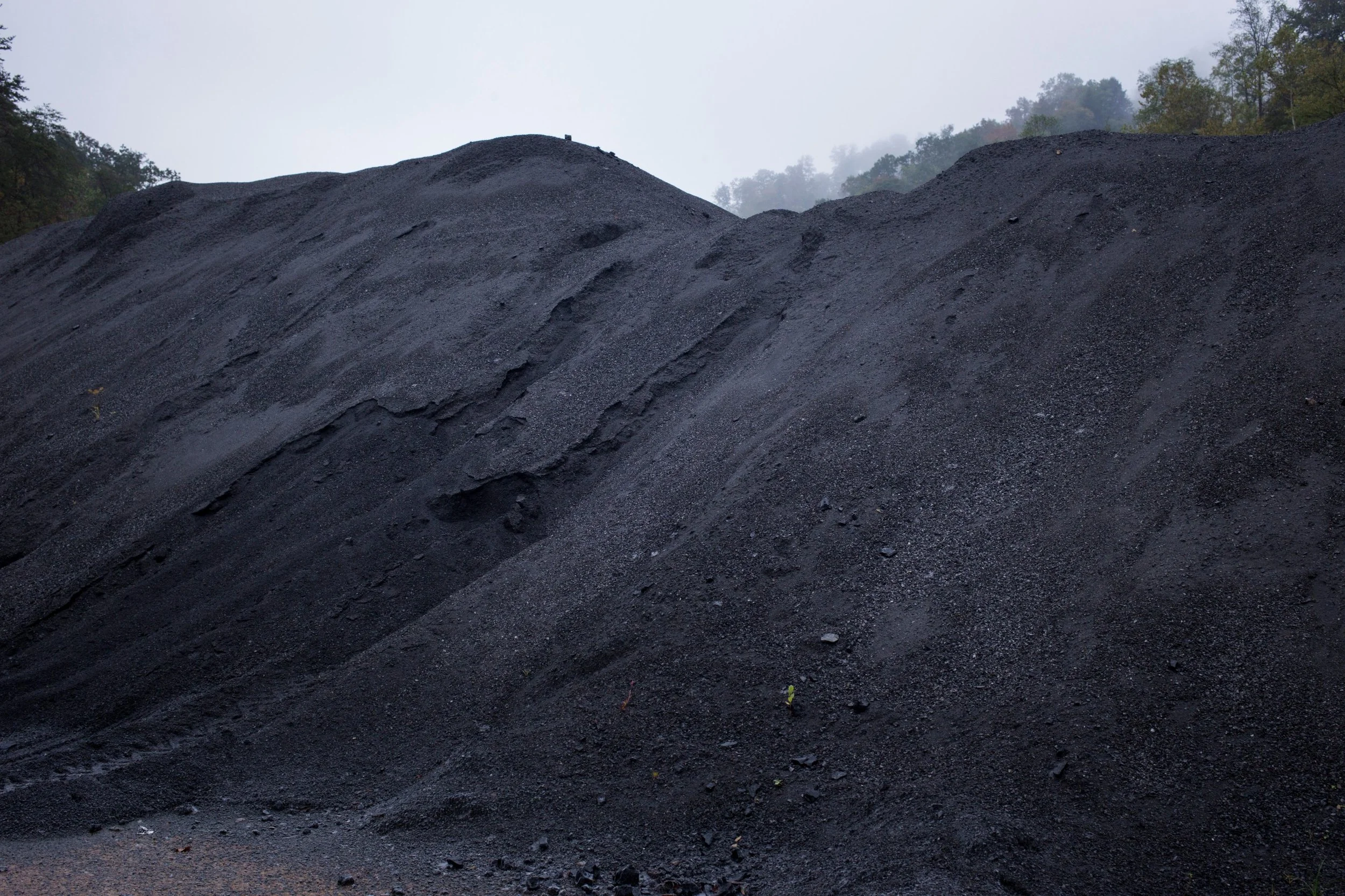  Remnants of coal are left sitting outside of a nonoperative coal wash in Justiceville, Kentucky, on Friday, September 29, 2017. (Photo by Brittany Greeson) 