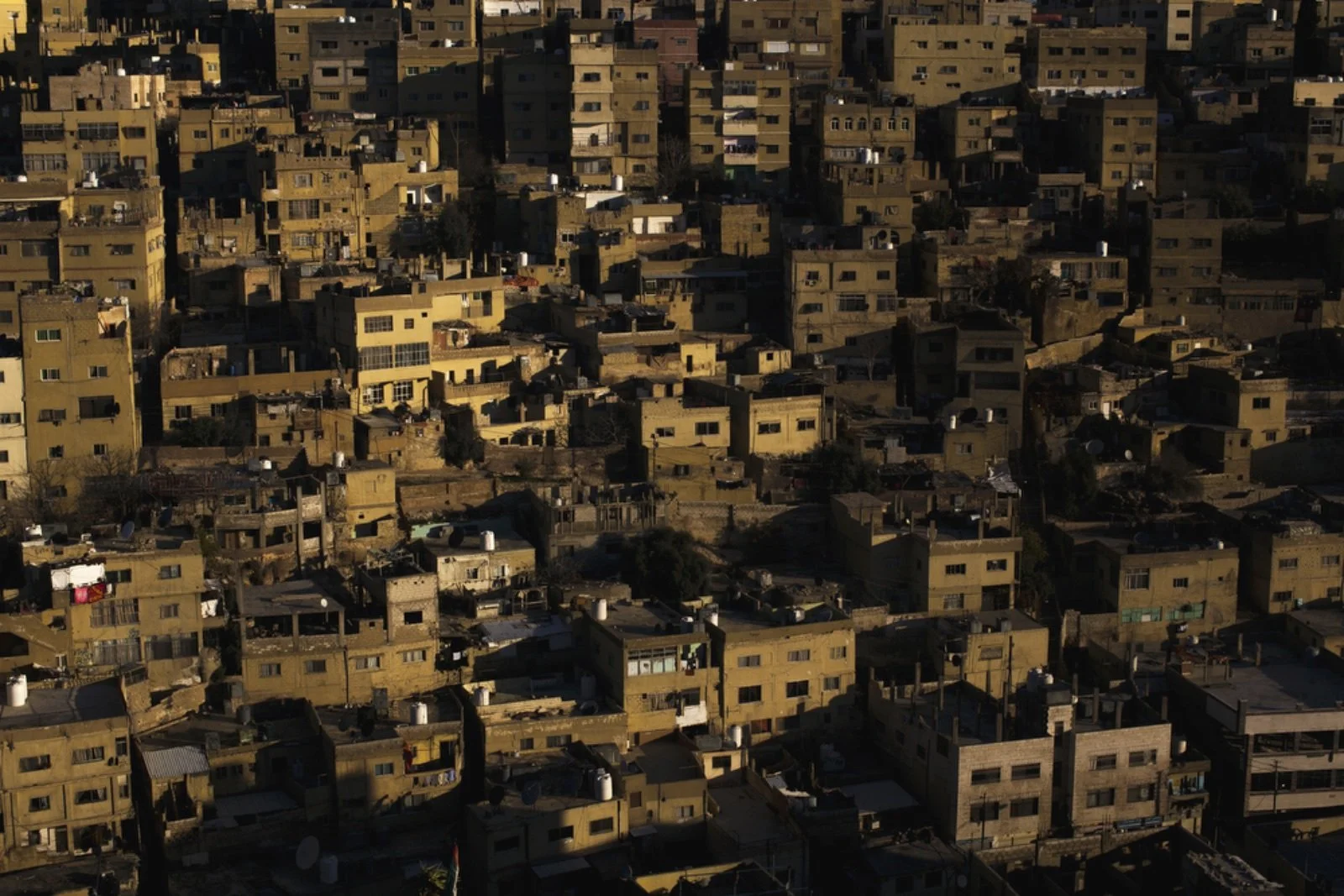  A view of Jabal Al Hussein Camp in Amman, Jordan. Originally built 1952 as a refugee camp for Palestinians fleeing conflict from the Arab-Israeli War, it has morphed into a permanent neighborhood in downtown Amman that houses Syrians, Egyptians and 