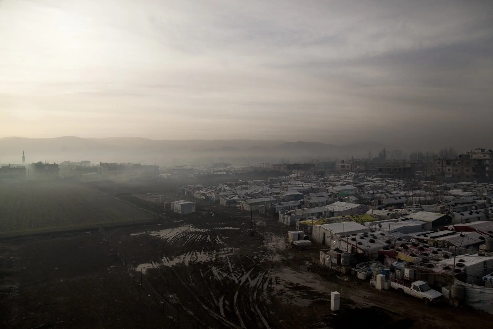  A view of an improvised tented settlement in the Bekaa Valley. (Christopher Lee/GroundTruth) 