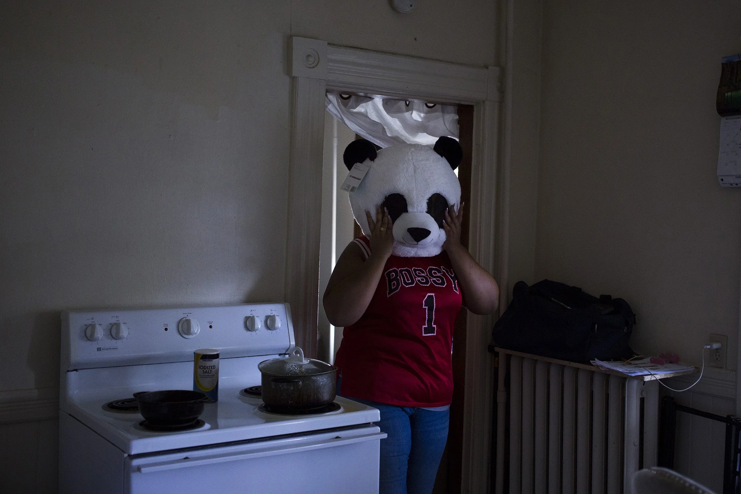  Destiny Montez, 17, shows her panda bear costume in the kitchen of her home in Springfield, Mass., on Saturday, September, 9, 2017. (Photo by Brittany Greeson) 