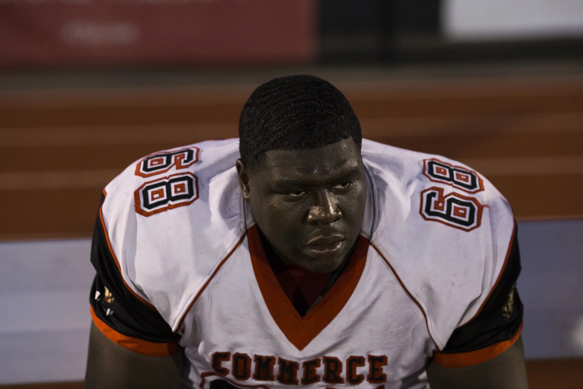  Taj Hylton, an offensive lineman, looks out onto the field as his team faces a score of 0-42 at halftime in West Springfield, Mass., on Friday, September, 8, 2017. (Photo by Brittany Greeson) 