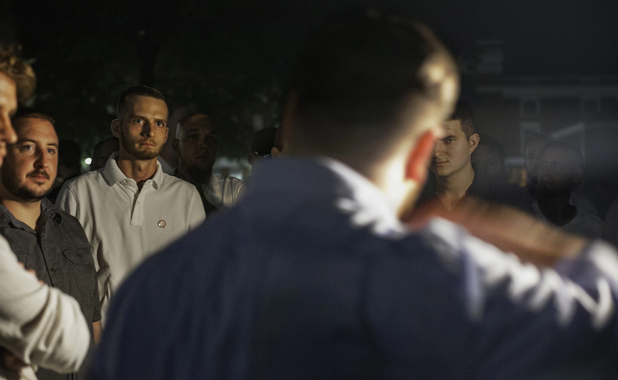  White supremacists gather at Nameless Field on the University of Virginia campus to organize a torch march on the Friday night before the Unite The Right rally. August 11, 2017 Charlottesville, VA. (Shay Horse/GroundTruth) 