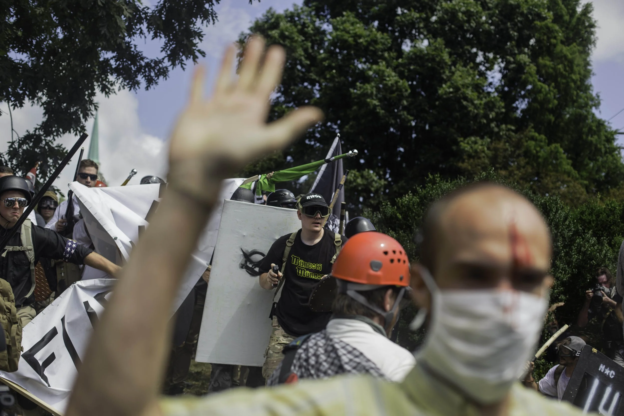  A counter protester retreats as clashes between the White Supremacists and the Antifa intensified on August &nbsp;12, 2017, in Charlottesville, VA. (Shay Horse/GroundTruth) 