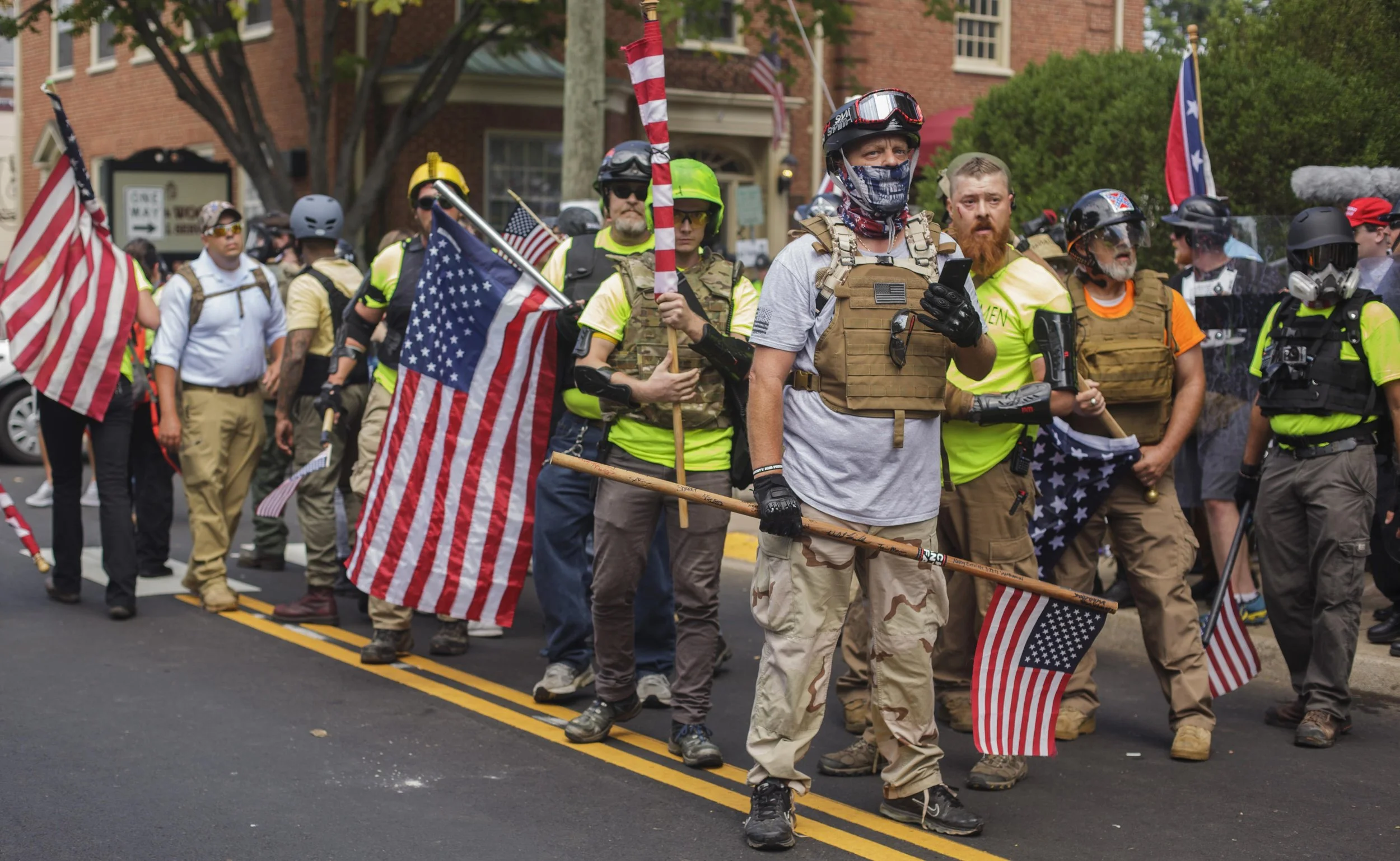  A counter protester retreats as clashes between the White Supremacists and the Antifa intensified on August &nbsp;12, 2017, in Charlottesville, VA. (Shay Horse/GroundTruth) 