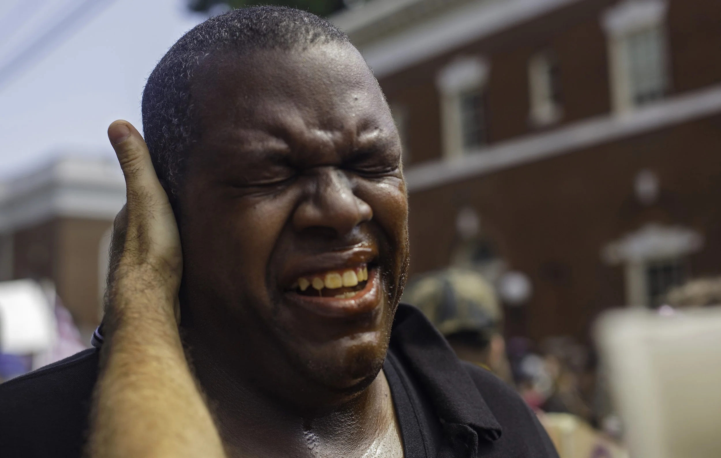  A counter protester is pepper sprayed by a white supremacist at Lee Park. August 12 , 2017 Charlottesville, VA. (Shay Horse/GroundTruth) 