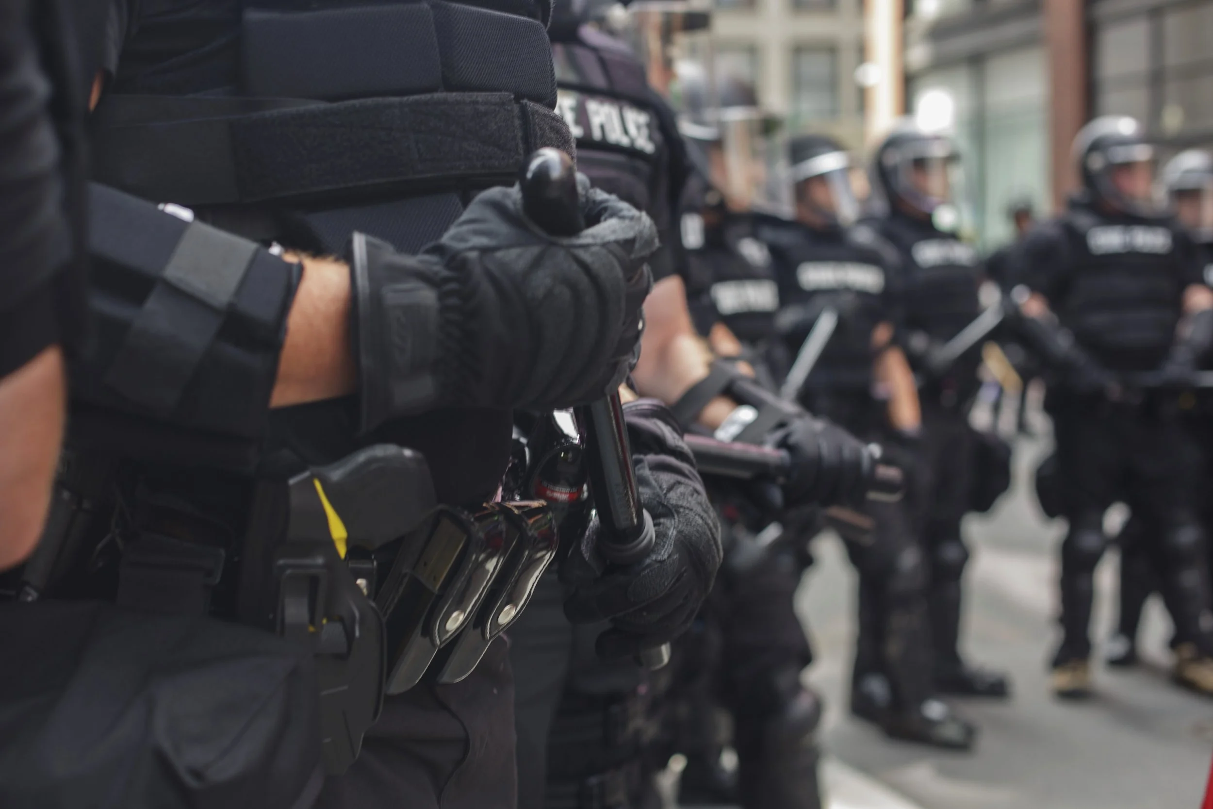  Boston police in riot gear cleared the streets of counter protesters who were blocking the road as the police escorted Free Speech rally attendees in paddy wagons. (Shay Horse/GroundTruth) 