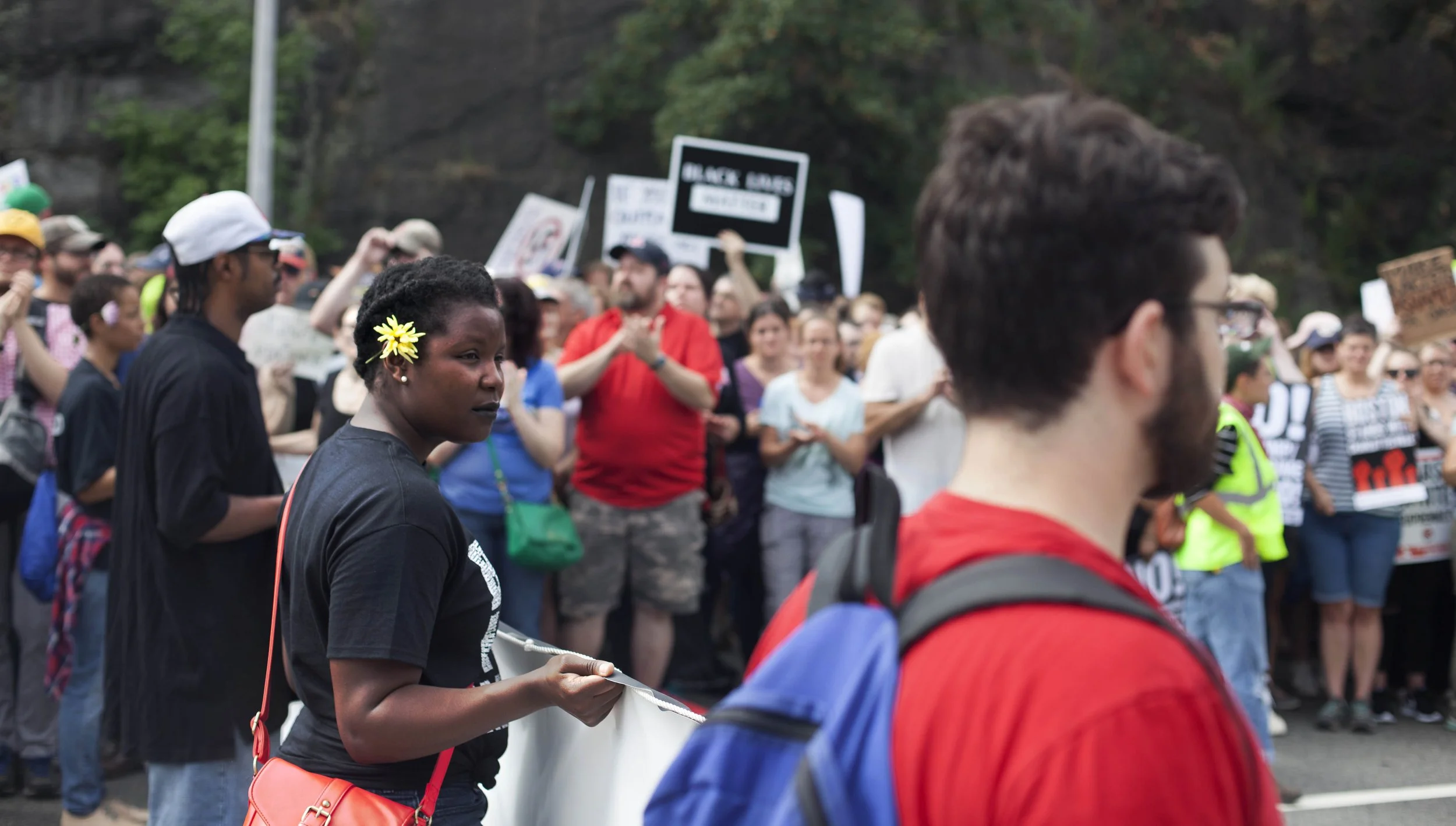  Counter protesters gathered at Reggie Lewis Track &amp; Field Center to march to the Boston Common, where the Free Speech Rally was being held. (Shay Horse/GroundTruth) 