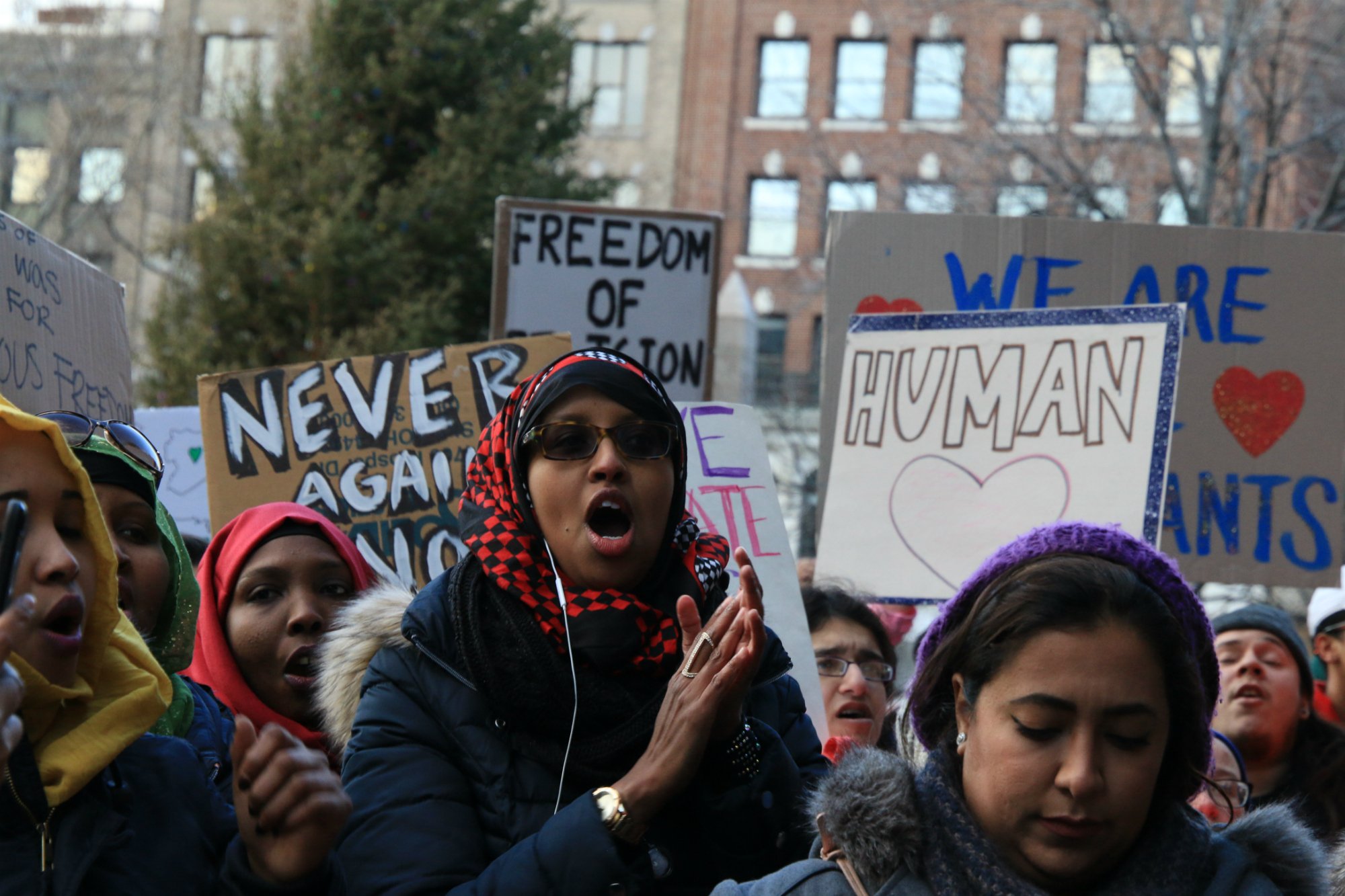  Demonstrators are pictured in Boston’s Copley Square on Jan. 29, 2017, protesting President Donald Trump’s executive order banning immigration from seven majority-Muslim countries. (Photo by Giulia Afiune/GroundTruth) 
