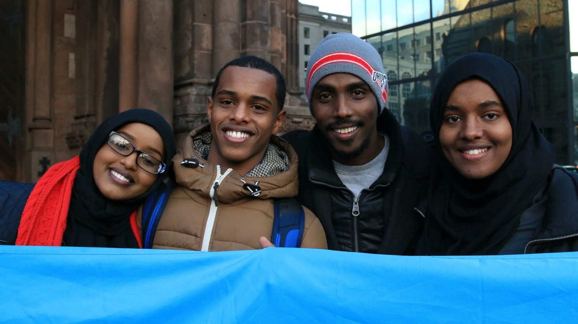  Hibo Moallim (left) was born in Kenya, but her family is originally from Somalia, one of the seven majority-Muslim countries affected by Trump’s ban. During a protest in Boston’s Copley Square, she and her cousins led the crowd singing “This is what