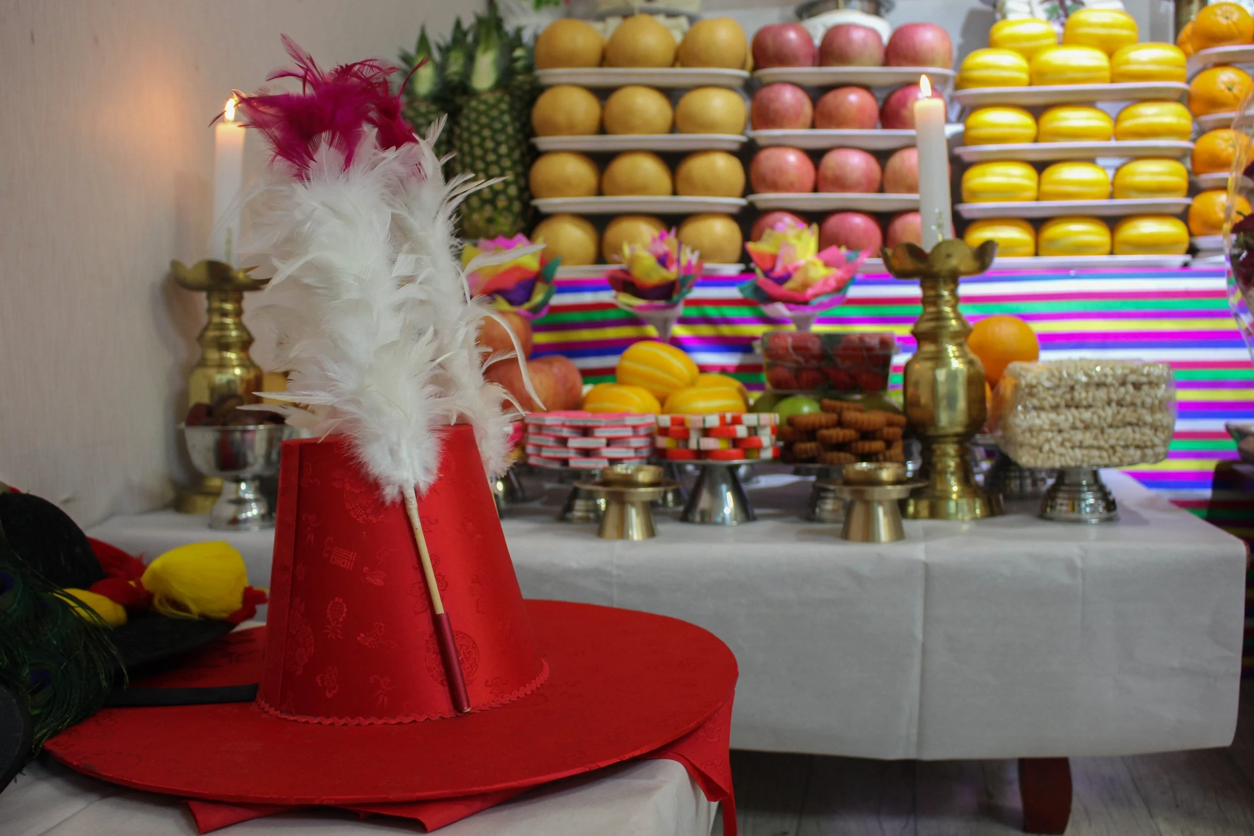  Most of the $15,000 Cho paid for the ceremony went towards buying offerings for the gods. At the end of the performance, the shamans tend to share the food among themselves, and donate whatever is left to charity. (Miranda Mazariegos/GroundTruth) 