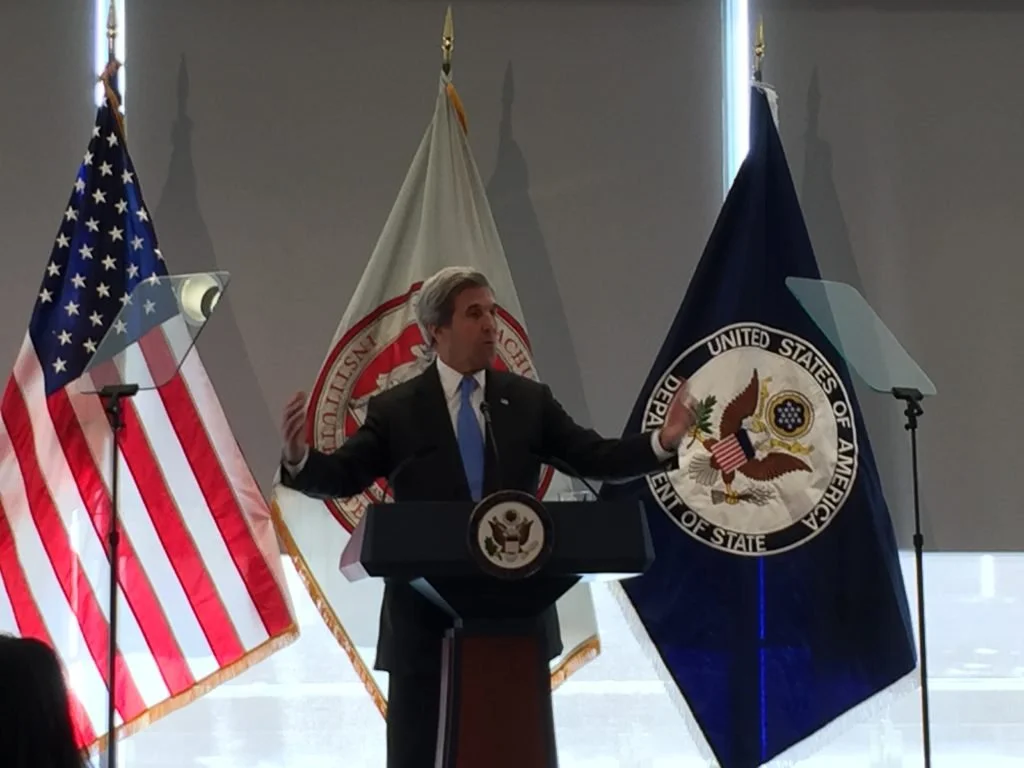 Kerry promises climate fight in Trump era