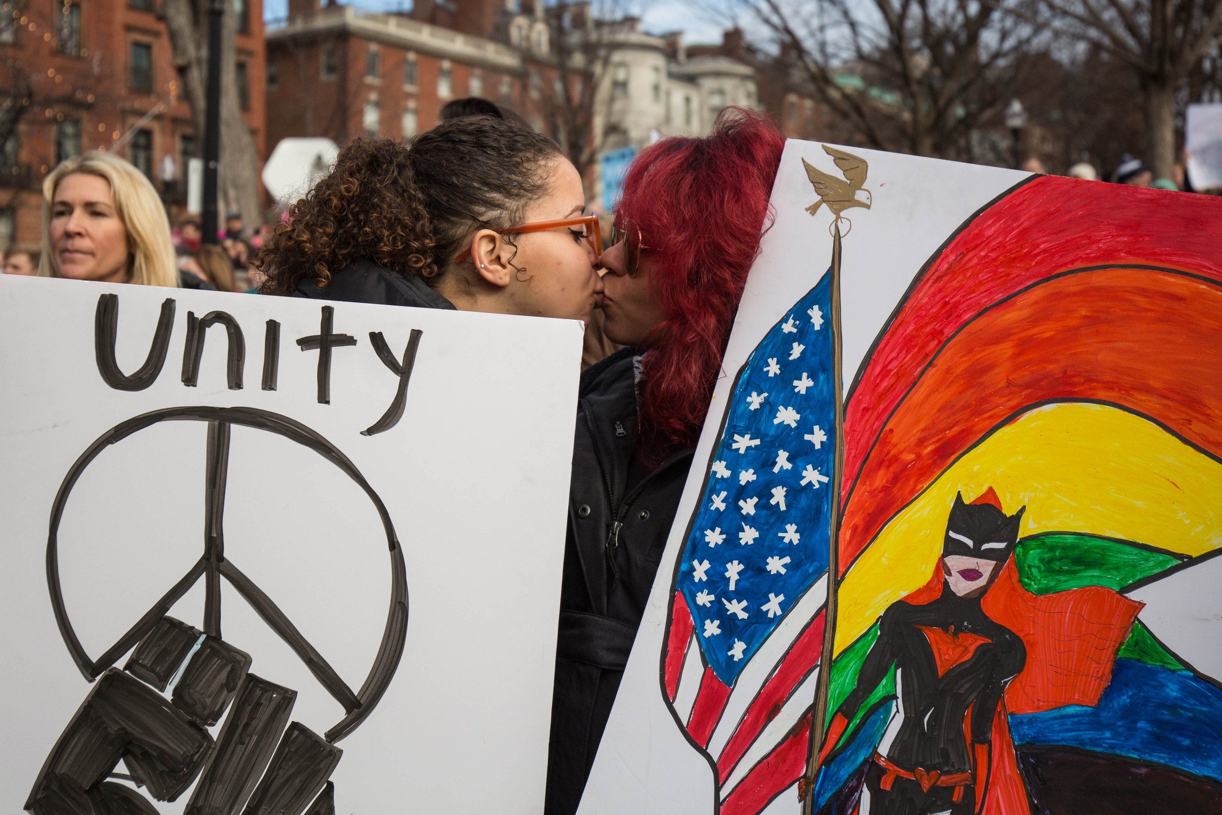  Audrey Guerrero, 25, of Boston, and Angie Egea, 27, of Colombia, kiss during the Boston Women’s March on Jan. 21, 2017. (Photo by Alastair Pike) 