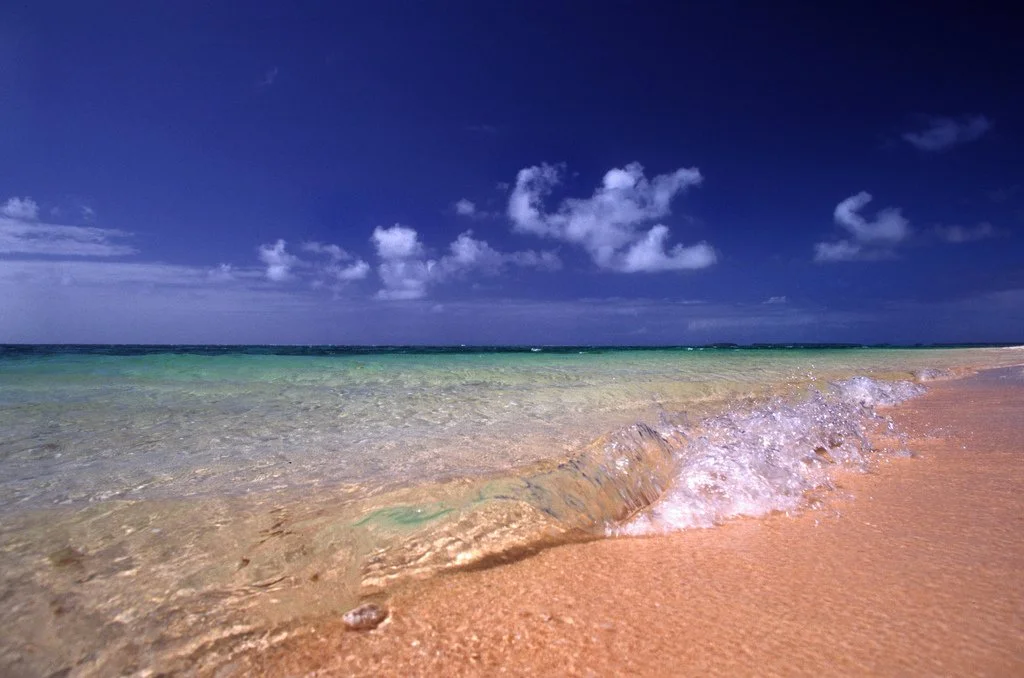 Telling of danger at home, island nations gain support for 1.5 degree warming target