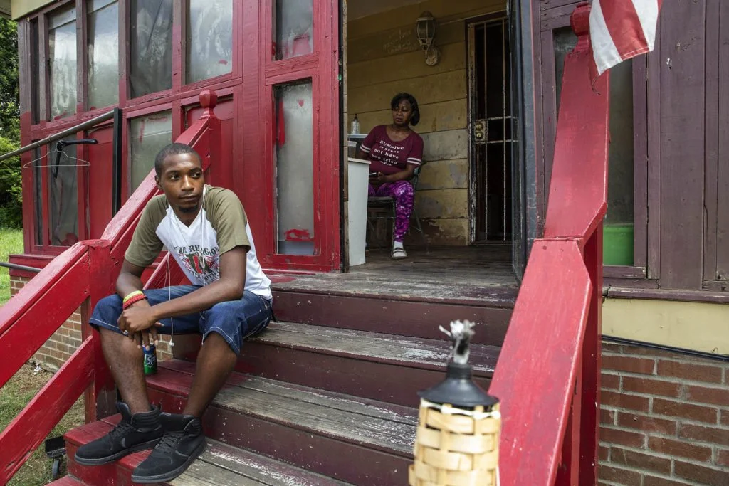  Evans sits on his stoop, July 3, 2018. (Photo by Eric J. Shelton/GroundTruth)      