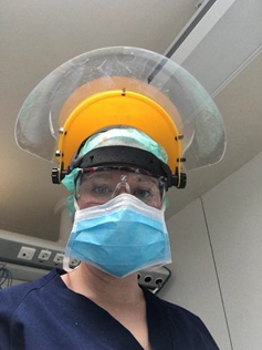  A doctor wears one of the face shields printed by volunteers. (Photo by Coronavirus Makers) 
