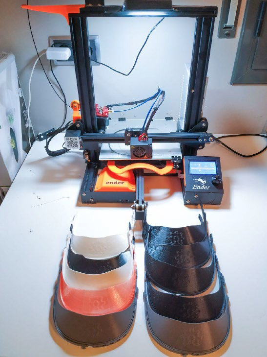  Volunteers work with domestic 3D printers and donated materials to produce masks and face shields. (Photo by Coronavirus Makers) 