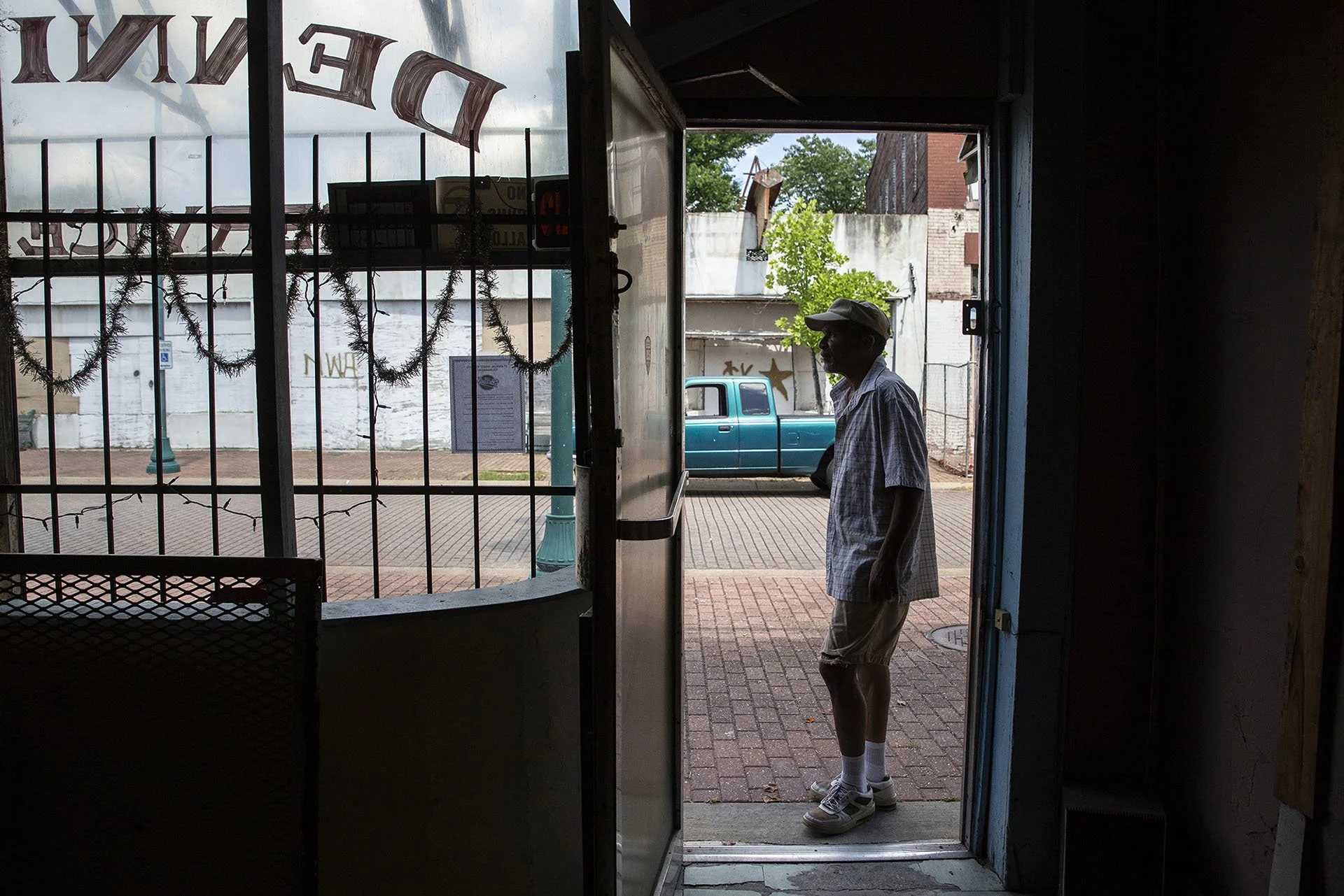  Tony “Dr. Shoemaker” Brothers looks at Farish Street while at his family’s business, Dennis Brothers Shoe Repair Service in the 300 block of Farish Street in Jackson Wednesday, June 27, 2018. (Photo by Eric J. Shelton/GroundTruth) 