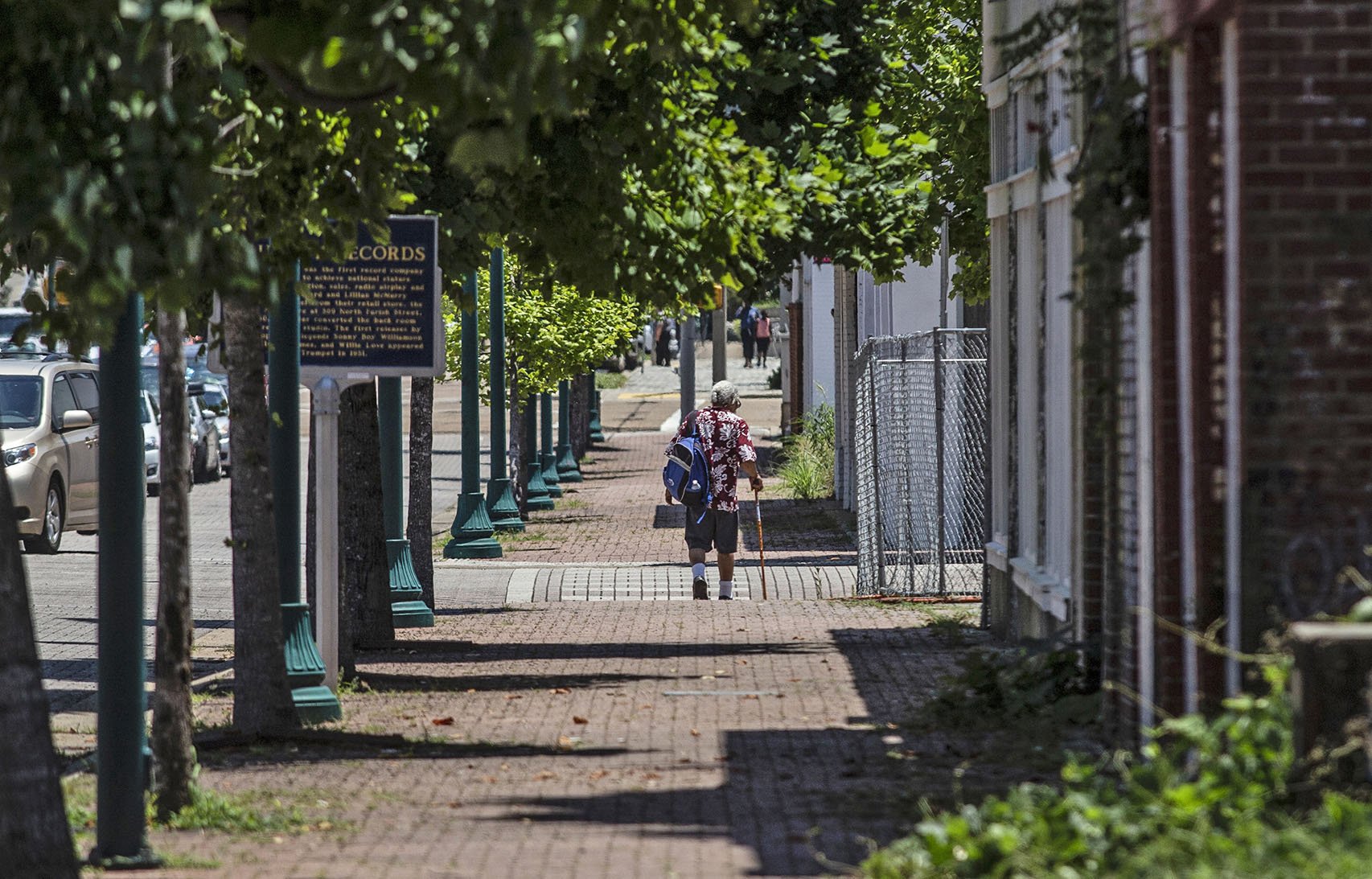  A pedestrian walks in the 300 block of North Farish Street in Jackson Friday, June 29, 2018. (Photo by Eric J. Shelton/GroundTruth) 