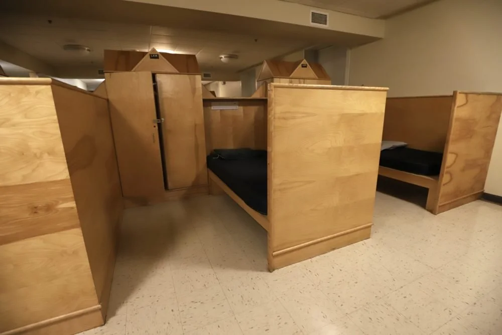  Empty beds are seen in Columbus House as people experiencing homelessness are moved into hotels and housing to help prevent the spread of the coronavirus. (Photo by Chris Ehrmann) 