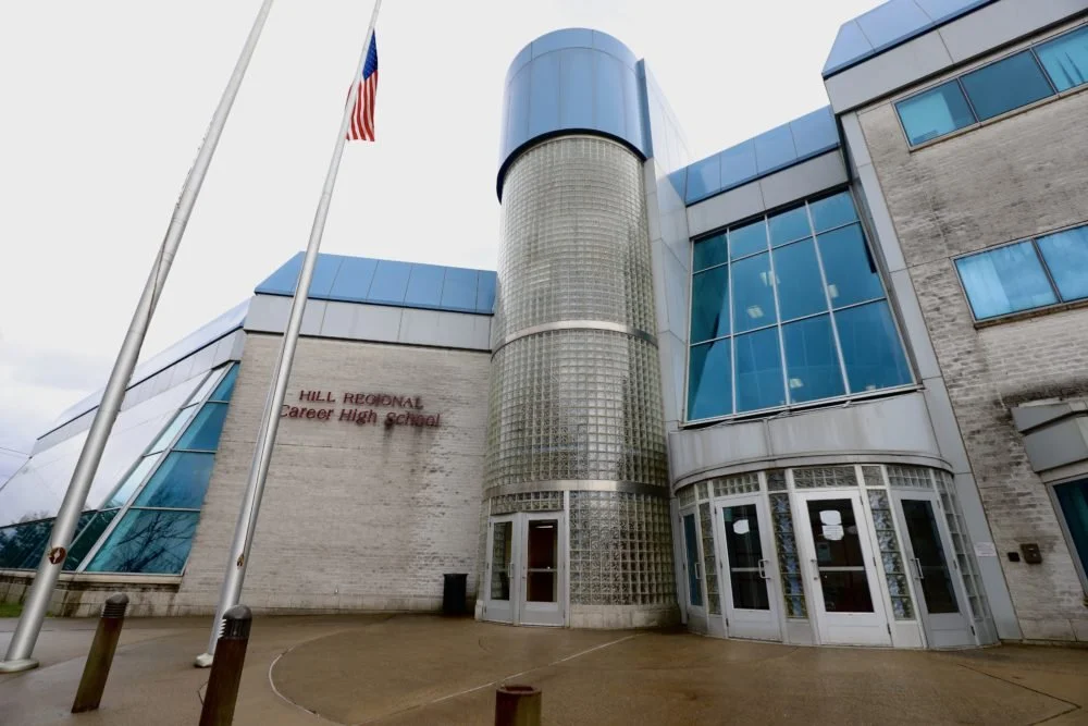   The entrance to Hill Regional Career High School where patients sick with COVID-19 are being housed in New Haven. (Photo by Chris Ehrmann/GroundTruth)  