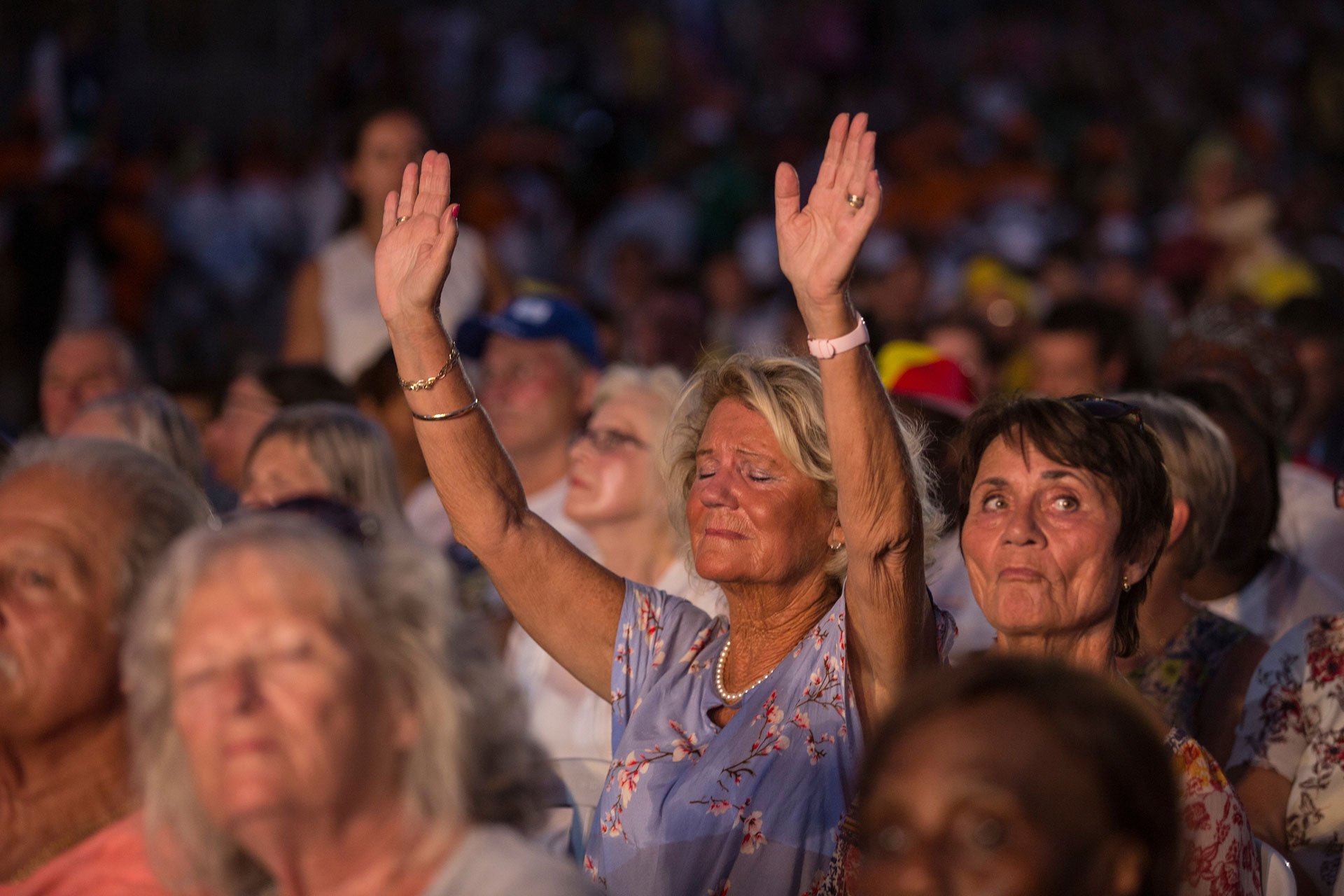 A worshipper prays during the opening ceremony of the Feast of Tabernacles. (Photo by Heidi Levine For The GroundTruth Project).