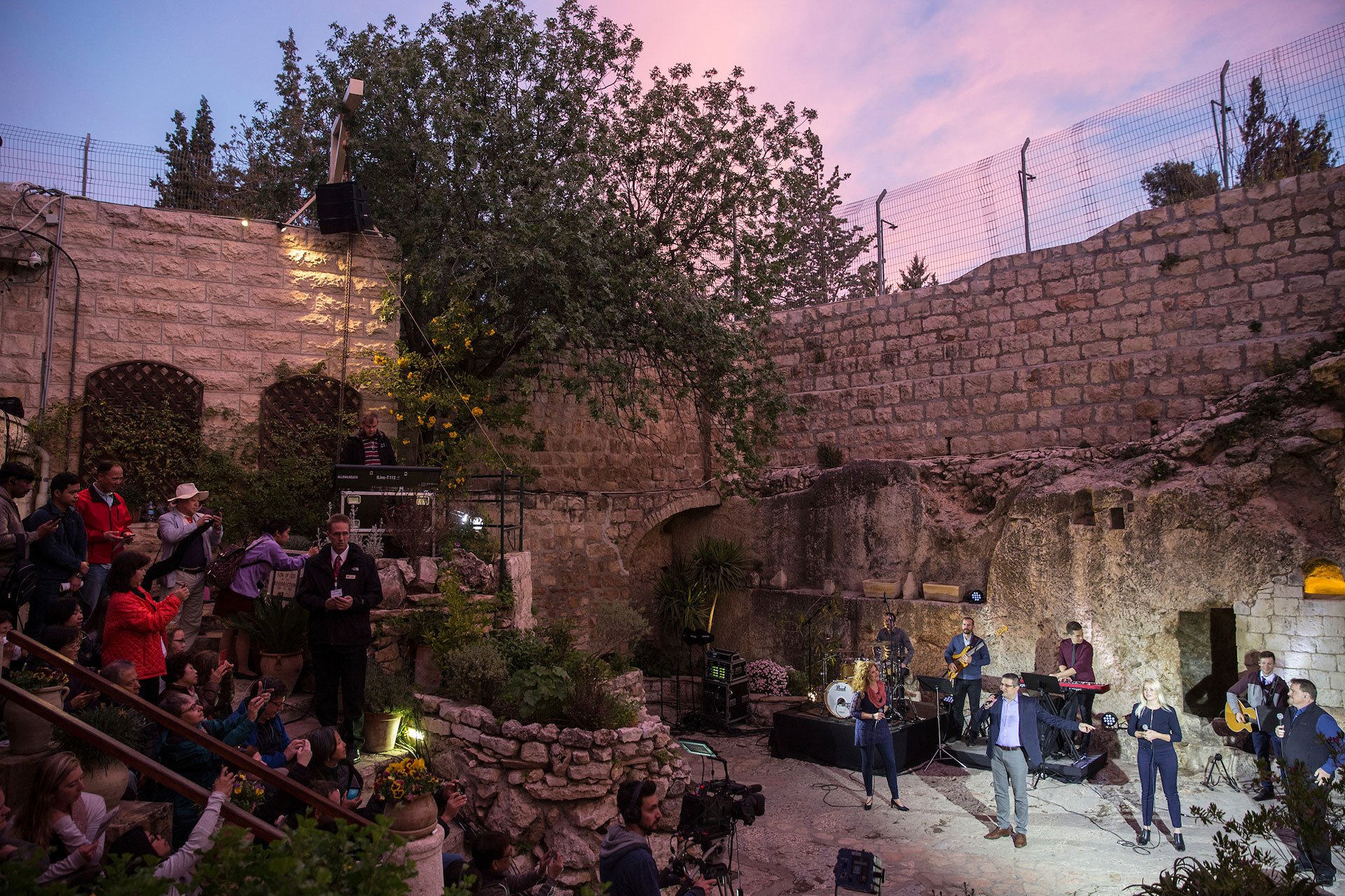 The ceremony at the Garden Tomb is accompanied by music. (Photo by Heidi Levine for The GroundTruth Project).