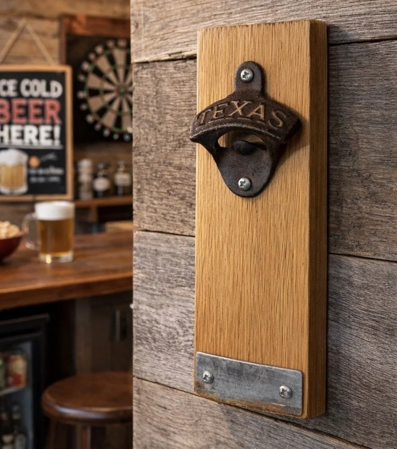 A wooden wall-mounted bottle opener with a Texas-shaped metal handle in a bar or restaurant setting.