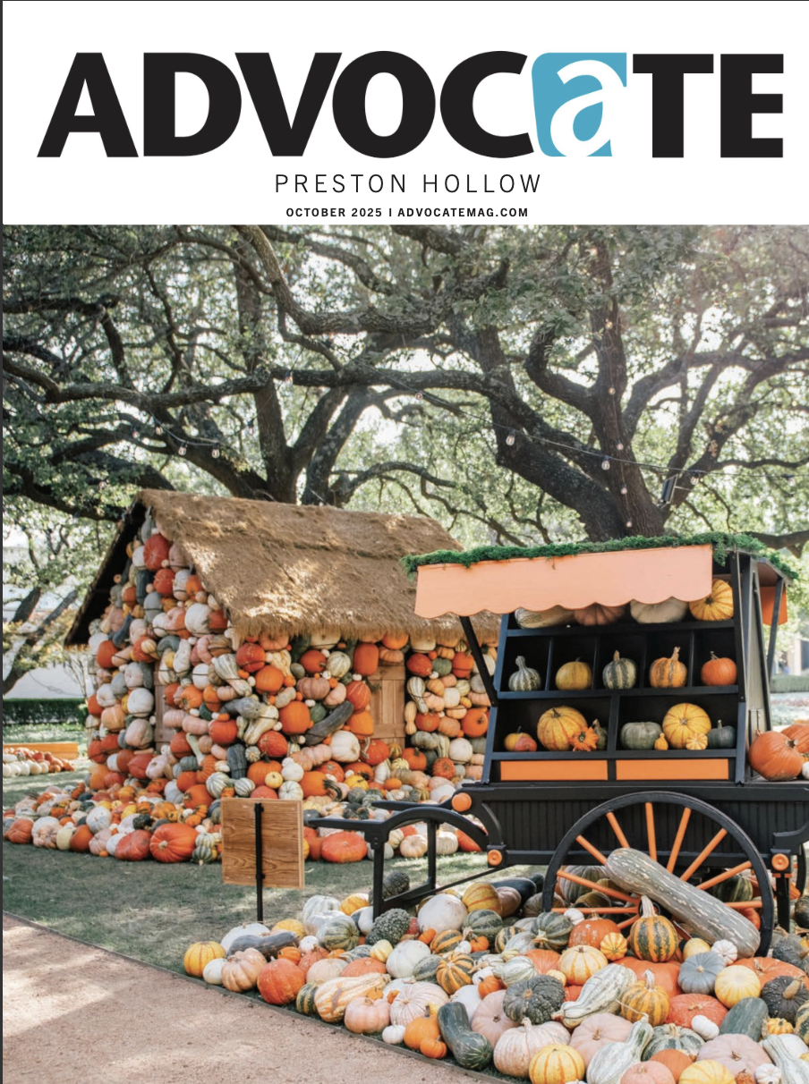 Magazine cover of Paper City featuring an interior view of a bungalow with large windows, a wooden table, and vintage furniture.