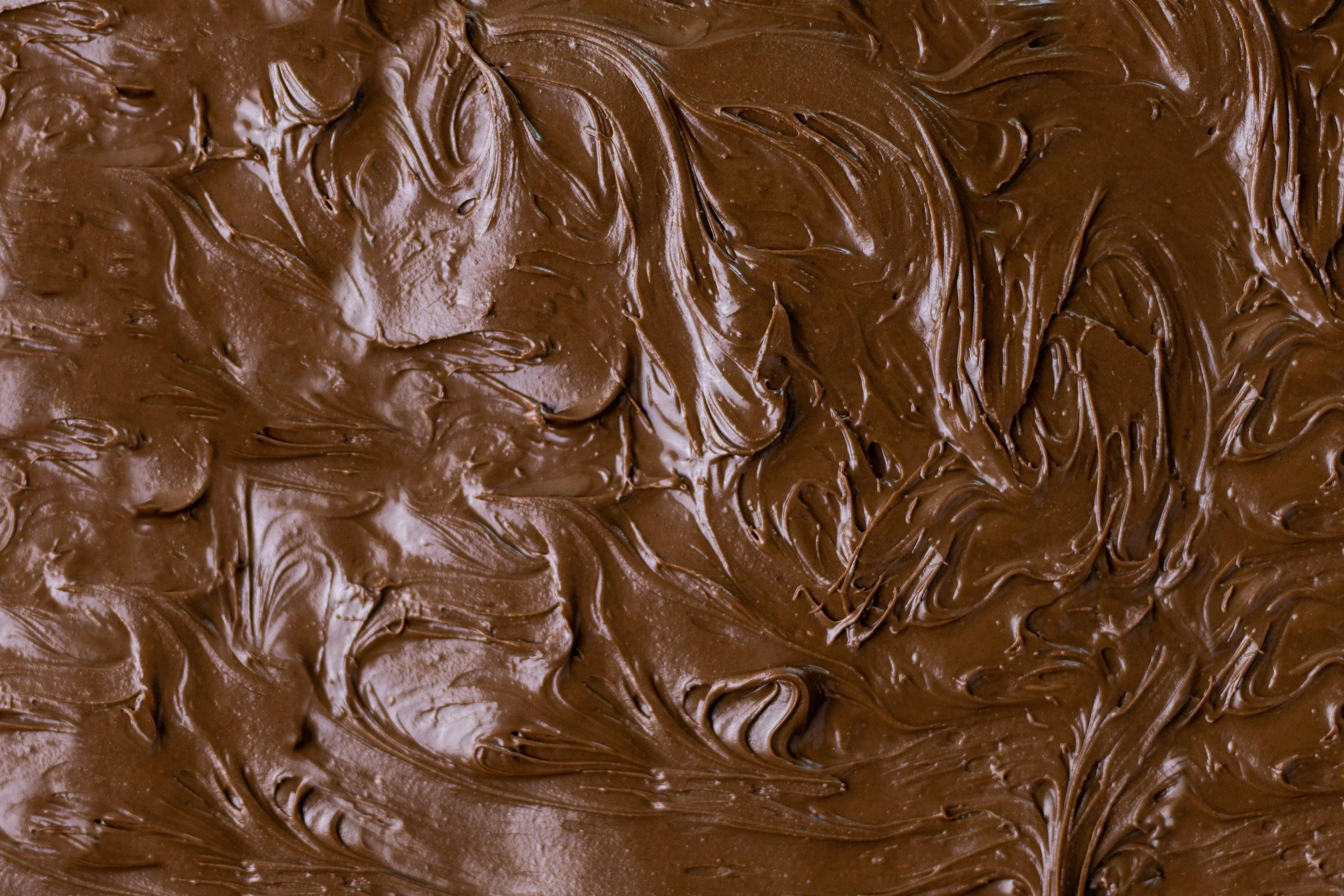 Close-up of smeared chocolate spread with swirls