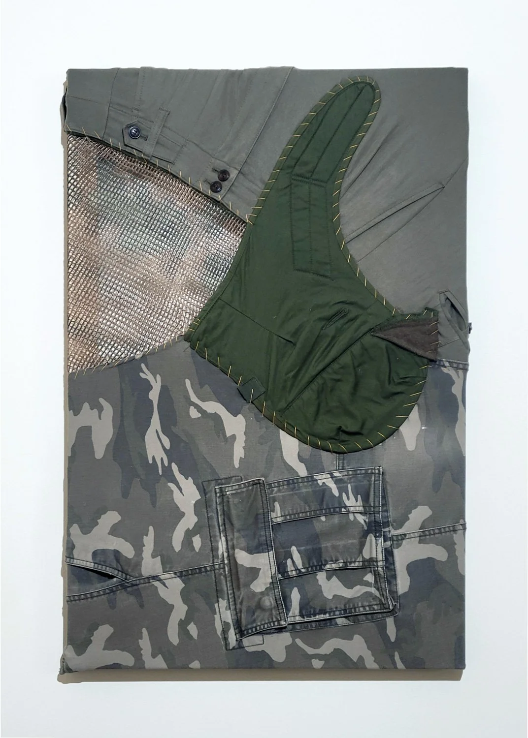 Trace, FM 10-16, Stitched reclaimed garments, sashiko thread on aluminum stretcher, 30 x 20 x 1.25 in., 2026